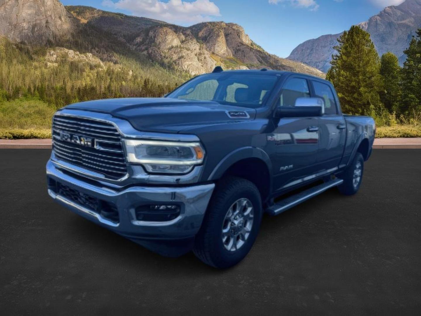 2022 GRAY /Black RAM 2500 Laramie Crew Cab SWB 4WD (3C6UR5FJ2NG) with an 6.4L V8 engine, 6-Speed Automatic transmission, located at 1235 N Woodruff Ave., Idaho Falls, 83401, (208) 523-1053, 43.507172, -112.000488 - At Timberline Auto, finding a great deal on your next vehicle is always easy! Our experienced sales staff's goal is to help find you the right vehicle at the right price! Our knowledgeable finance department has options for almost any credit score. We offer extended service contract options to prote - Photo#0