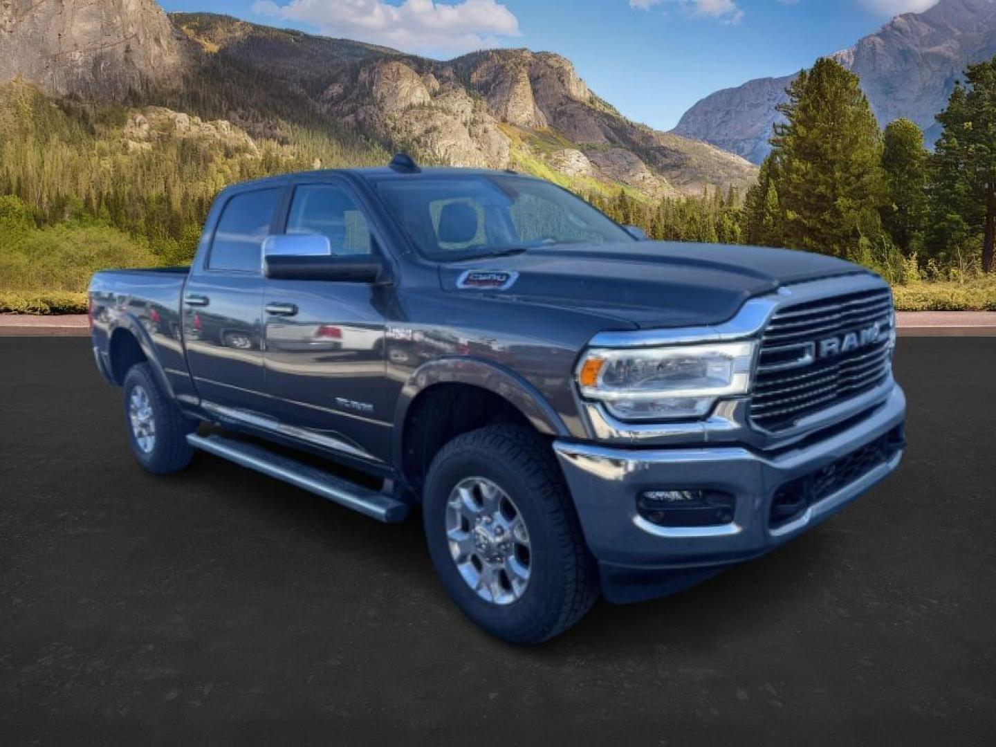 2022 GRAY /Black RAM 2500 Laramie Crew Cab SWB 4WD (3C6UR5FJ2NG) with an 6.4L V8 engine, 6-Speed Automatic transmission, located at 1235 N Woodruff Ave., Idaho Falls, 83401, (208) 523-1053, 43.507172, -112.000488 - At Timberline Auto, finding a great deal on your next vehicle is always easy! Our experienced sales staff's goal is to help find you the right vehicle at the right price! Our knowledgeable finance department has options for almost any credit score. We offer extended service contract options to prote - Photo#3