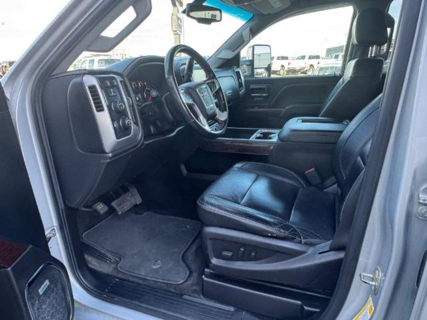 2018 Quicksilver Metallic /Jet Black, leather GMC Sierra 2500HD SLT Crew Cab 4WD (1GT12TEG8JF) with an 6.0L V8 OHV 16V FFV engine, 6-Speed Automatic transmission, located at 1235 N Woodruff Ave., Idaho Falls, 83401, (208) 523-1053, 43.507172, -112.000488 - At Timberline Auto, finding a great deal on your next vehicle is always easy! Our experienced sales staff's goal is to help find you the right vehicle at the right price! Our knowledgeable finance department has options for almost any credit score. We offer extended service contract options to prote - Photo#12
