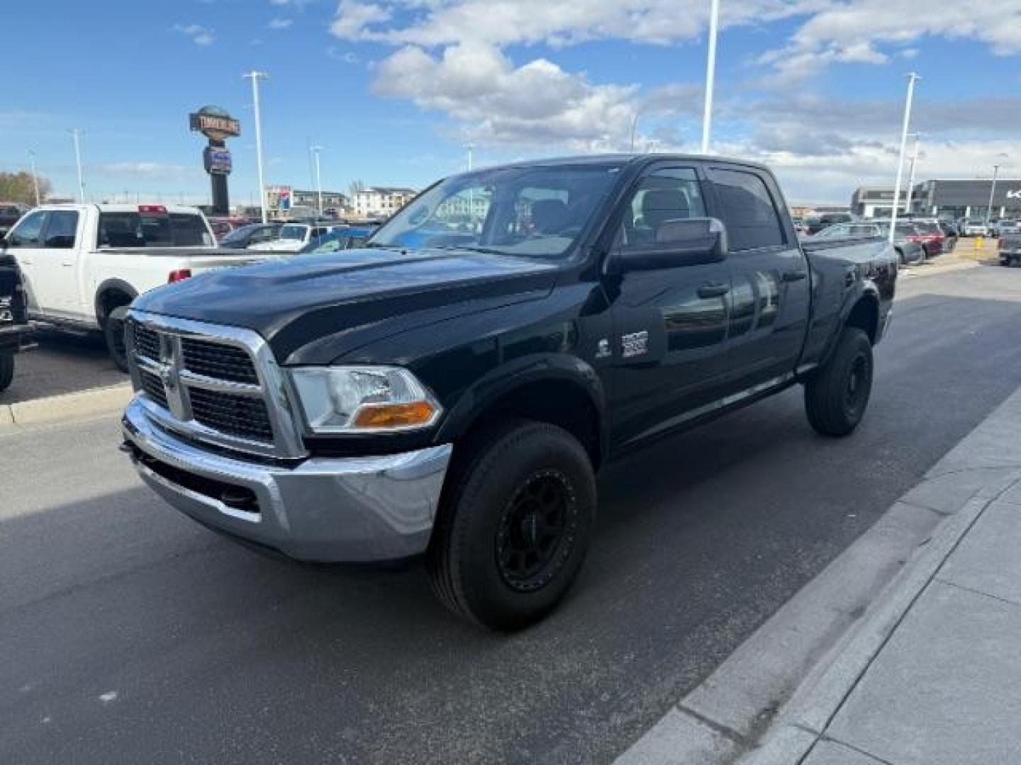 2011 BLACK /Dark Slate/Medium Graystone Cloth Interior RAM 2500 ST Crew Cab LWB 4WD (3D7UT2CL4BG) with an 6.7L L6 OHV 24V TURBO DIESEL engine, 5-Speed Automatic transmission, located at 1235 N Woodruff Ave., Idaho Falls, 83401, (208) 523-1053, 43.507172, -112.000488 - At Timberline Auto, finding a great deal on your next vehicle is always easy! Our experienced sales staff's goal is to help find you the right vehicle at the right price! Our knowledgeable finance department has options for almost any credit score. We offer extended service contract options to prote - Photo#0