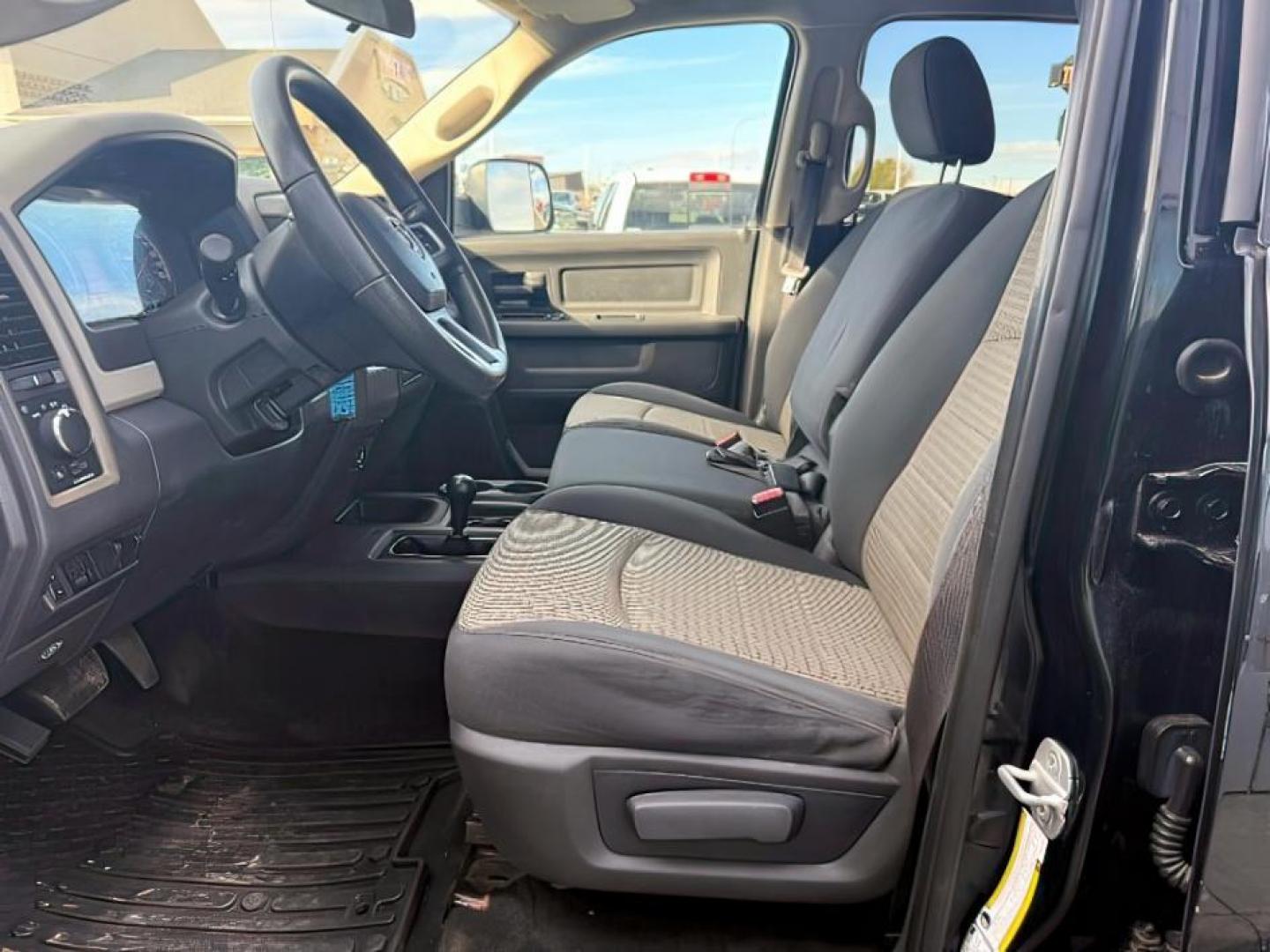 2011 BLACK /Dark Slate/Medium Graystone Cloth Interior RAM 2500 ST Crew Cab LWB 4WD (3D7UT2CL4BG) with an 6.7L L6 OHV 24V TURBO DIESEL engine, 5-Speed Automatic transmission, located at 1235 N Woodruff Ave., Idaho Falls, 83401, (208) 523-1053, 43.507172, -112.000488 - At Timberline Auto, finding a great deal on your next vehicle is always easy! Our experienced sales staff's goal is to help find you the right vehicle at the right price! Our knowledgeable finance department has options for almost any credit score. We offer extended service contract options to prote - Photo#9