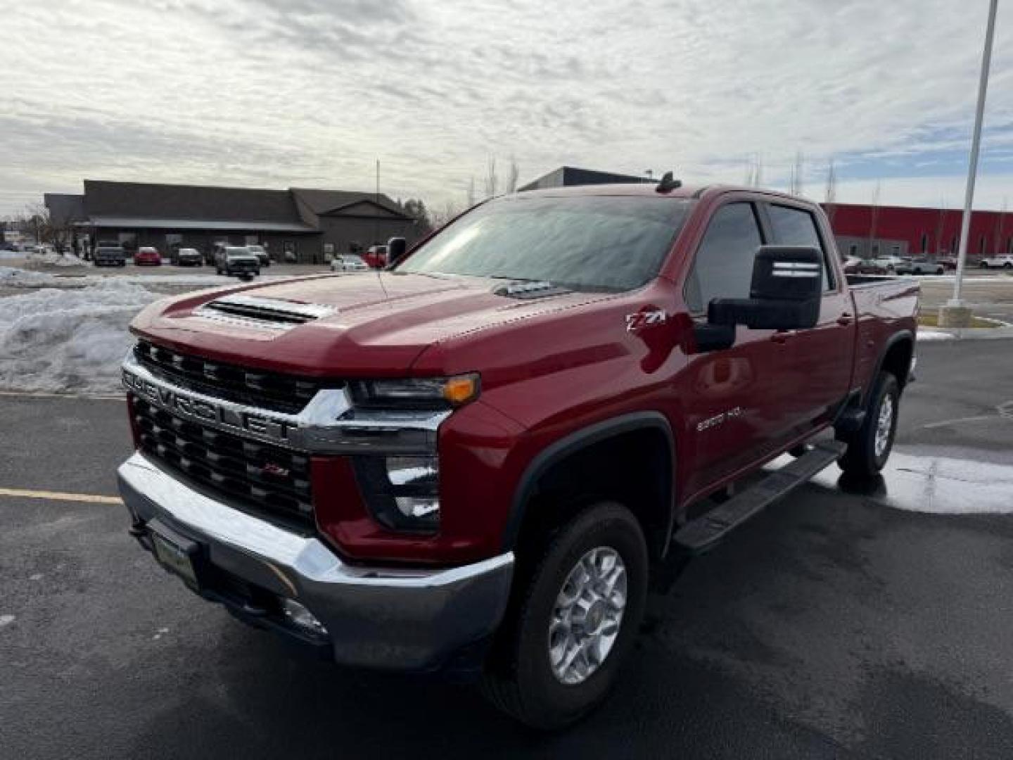 2023 Cherry Red Tintcoat /Jet Black Chevrolet Silverado 2500HD LT Crew Cab Short Box 4WD (1GC4YNEY1PF) with an 6.6L V8 OHV 16V DIESEL engine, 6-Speed Automatic transmission, located at 1235 N Woodruff Ave., Idaho Falls, 83401, (208) 523-1053, 43.507172, -112.000488 - At Timberline Auto, finding a great deal on your next vehicle is always easy! Our experienced sales staff's goal is to help find you the right vehicle at the right price! Our knowledgeable finance department has options for almost any credit score. We offer extended service contract options to prote - Photo#0