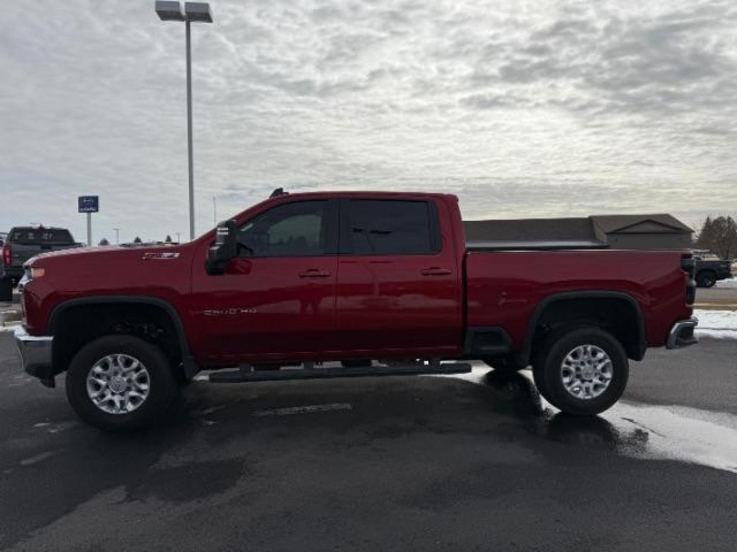 2023 Cherry Red Tintcoat /Jet Black Chevrolet Silverado 2500HD LT Crew Cab Short Box 4WD (1GC4YNEY1PF) with an 6.6L V8 OHV 16V DIESEL engine, 6-Speed Automatic transmission, located at 1235 N Woodruff Ave., Idaho Falls, 83401, (208) 523-1053, 43.507172, -112.000488 - At Timberline Auto, finding a great deal on your next vehicle is always easy! Our experienced sales staff's goal is to help find you the right vehicle at the right price! Our knowledgeable finance department has options for almost any credit score. We offer extended service contract options to prote - Photo#1