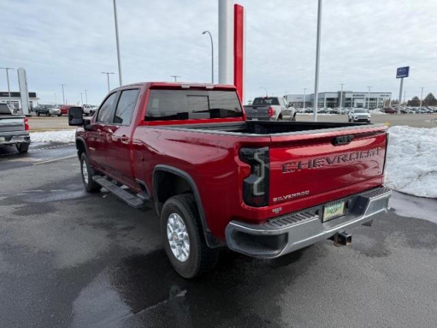 2023 Cherry Red Tintcoat /Jet Black Chevrolet Silverado 2500HD LT Crew Cab Short Box 4WD (1GC4YNEY1PF) with an 6.6L V8 OHV 16V DIESEL engine, 6-Speed Automatic transmission, located at 1235 N Woodruff Ave., Idaho Falls, 83401, (208) 523-1053, 43.507172, -112.000488 - At Timberline Auto, finding a great deal on your next vehicle is always easy! Our experienced sales staff's goal is to help find you the right vehicle at the right price! Our knowledgeable finance department has options for almost any credit score. We offer extended service contract options to prote - Photo#2