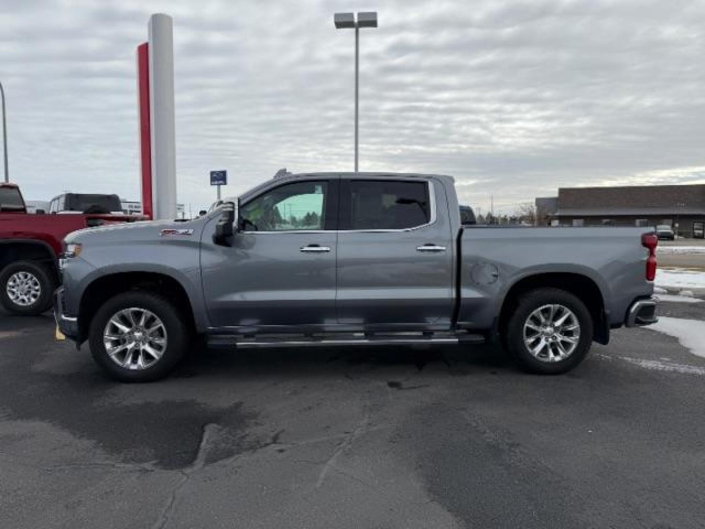 2021 Silver Ice Metallic /Jet Black, leather Chevrolet Silverado 1500 LTZ Crew Cab 4WD (1GCUYGED3MZ) with an 5.3L V8 OHV 16V engine, 6-Speed Automatic transmission, located at 1235 N Woodruff Ave., Idaho Falls, 83401, (208) 523-1053, 43.507172, -112.000488 - Photo#1