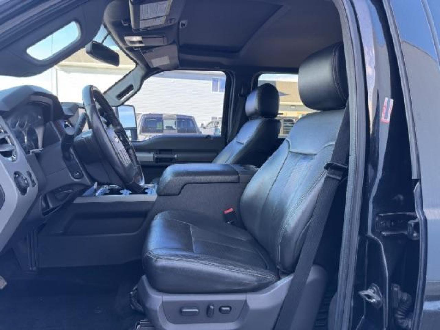 2016 BLACK /LEATHER Ford F-350 SD Lariat Crew Cab 4WD (1FT8W3BTXGE) with an 6.7L V8 OHV 16V DIESEL engine, 6-Speed Automatic transmission, located at 1235 N Woodruff Ave., Idaho Falls, 83401, (208) 523-1053, 43.507172, -112.000488 - At Timberline Auto, finding a great deal on your next vehicle is always easy! Our experienced sales staff's goal is to help find you the right vehicle at the right price! Our knowledgeable finance department has options for almost any credit score. We offer extended service contract options to prote - Photo#11