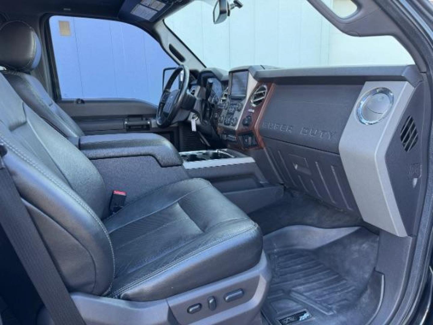 2016 BLACK /LEATHER Ford F-350 SD Lariat Crew Cab 4WD (1FT8W3BTXGE) with an 6.7L V8 OHV 16V DIESEL engine, 6-Speed Automatic transmission, located at 1235 N Woodruff Ave., Idaho Falls, 83401, (208) 523-1053, 43.507172, -112.000488 - At Timberline Auto, finding a great deal on your next vehicle is always easy! Our experienced sales staff's goal is to help find you the right vehicle at the right price! Our knowledgeable finance department has options for almost any credit score. We offer extended service contract options to prote - Photo#13