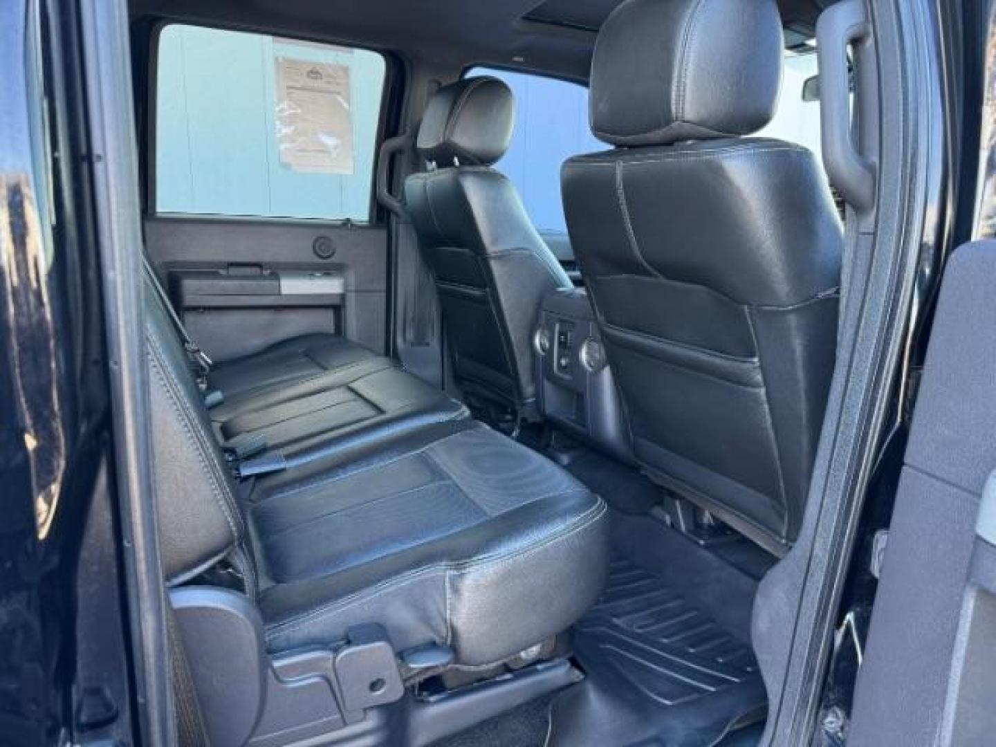 2016 BLACK /LEATHER Ford F-350 SD Lariat Crew Cab 4WD (1FT8W3BTXGE) with an 6.7L V8 OHV 16V DIESEL engine, 6-Speed Automatic transmission, located at 1235 N Woodruff Ave., Idaho Falls, 83401, (208) 523-1053, 43.507172, -112.000488 - At Timberline Auto, finding a great deal on your next vehicle is always easy! Our experienced sales staff's goal is to help find you the right vehicle at the right price! Our knowledgeable finance department has options for almost any credit score. We offer extended service contract options to prote - Photo#14