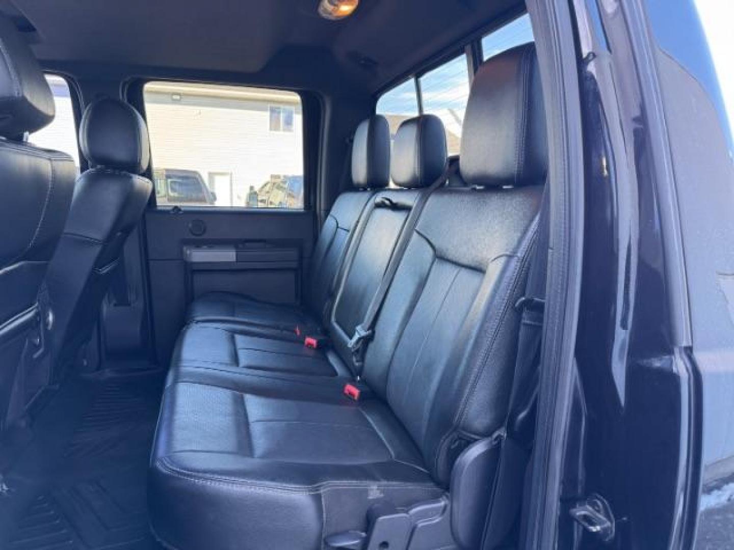 2016 BLACK /LEATHER Ford F-350 SD Lariat Crew Cab 4WD (1FT8W3BTXGE) with an 6.7L V8 OHV 16V DIESEL engine, 6-Speed Automatic transmission, located at 1235 N Woodruff Ave., Idaho Falls, 83401, (208) 523-1053, 43.507172, -112.000488 - At Timberline Auto, finding a great deal on your next vehicle is always easy! Our experienced sales staff's goal is to help find you the right vehicle at the right price! Our knowledgeable finance department has options for almost any credit score. We offer extended service contract options to prote - Photo#15