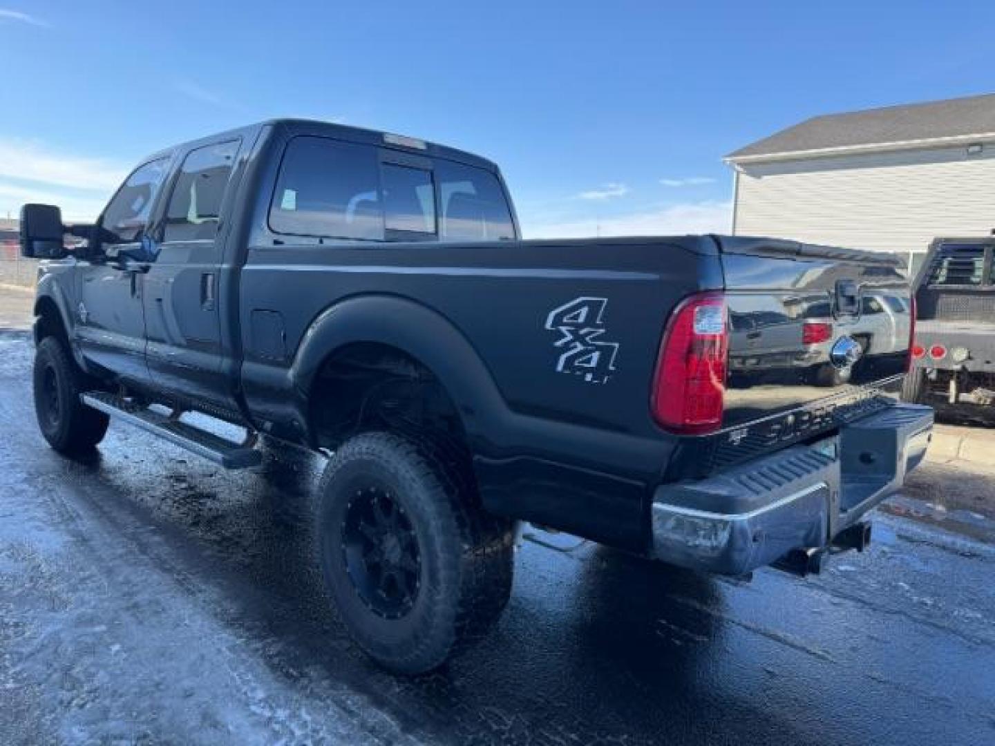 2016 BLACK /LEATHER Ford F-350 SD Lariat Crew Cab 4WD (1FT8W3BTXGE) with an 6.7L V8 OHV 16V DIESEL engine, 6-Speed Automatic transmission, located at 1235 N Woodruff Ave., Idaho Falls, 83401, (208) 523-1053, 43.507172, -112.000488 - At Timberline Auto, finding a great deal on your next vehicle is always easy! Our experienced sales staff's goal is to help find you the right vehicle at the right price! Our knowledgeable finance department has options for almost any credit score. We offer extended service contract options to prote - Photo#4