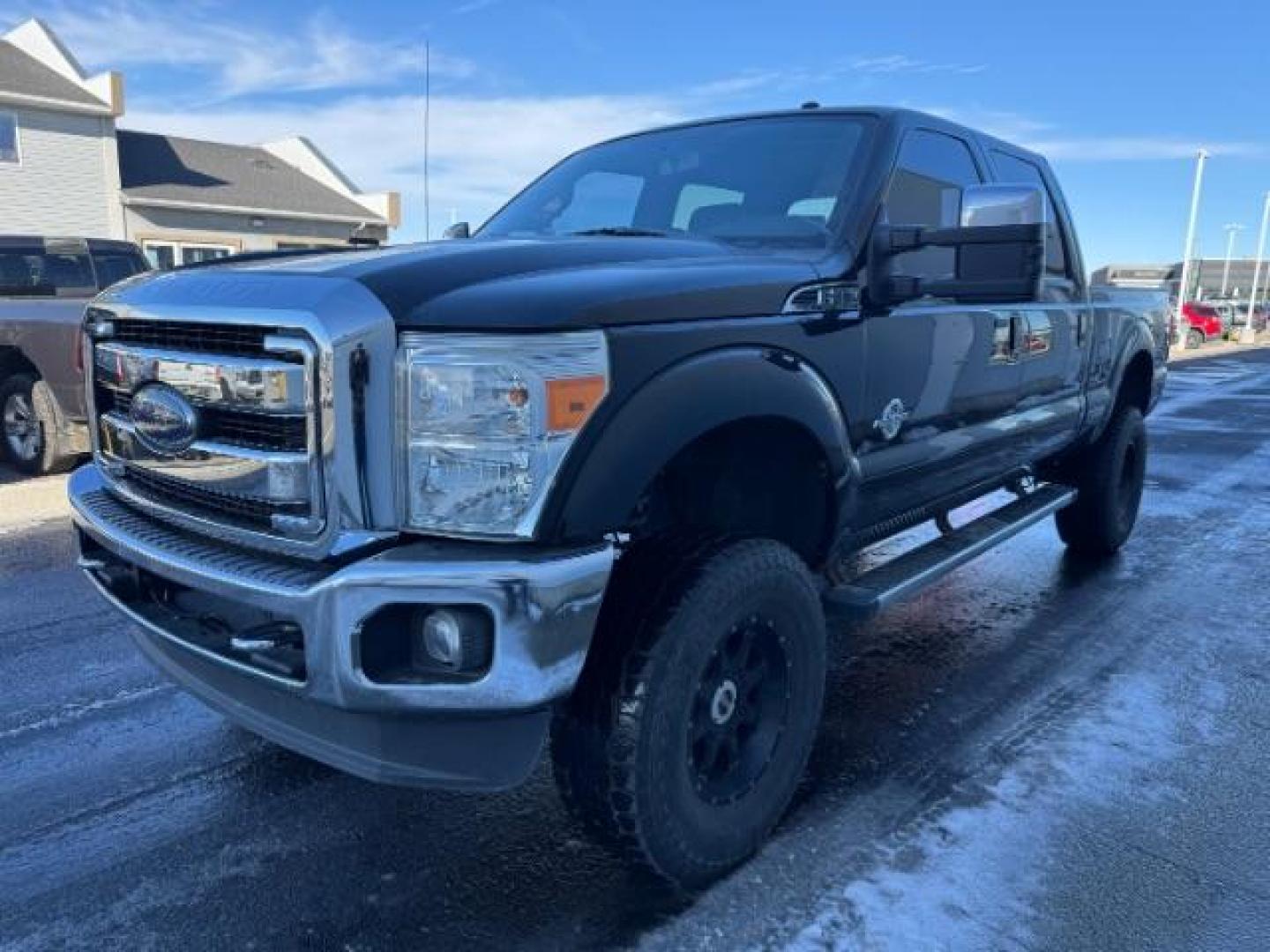 2016 BLACK /LEATHER Ford F-350 SD Lariat Crew Cab 4WD (1FT8W3BTXGE) with an 6.7L V8 OHV 16V DIESEL engine, 6-Speed Automatic transmission, located at 1235 N Woodruff Ave., Idaho Falls, 83401, (208) 523-1053, 43.507172, -112.000488 - At Timberline Auto, finding a great deal on your next vehicle is always easy! Our experienced sales staff's goal is to help find you the right vehicle at the right price! Our knowledgeable finance department has options for almost any credit score. We offer extended service contract options to prote - Photo#5