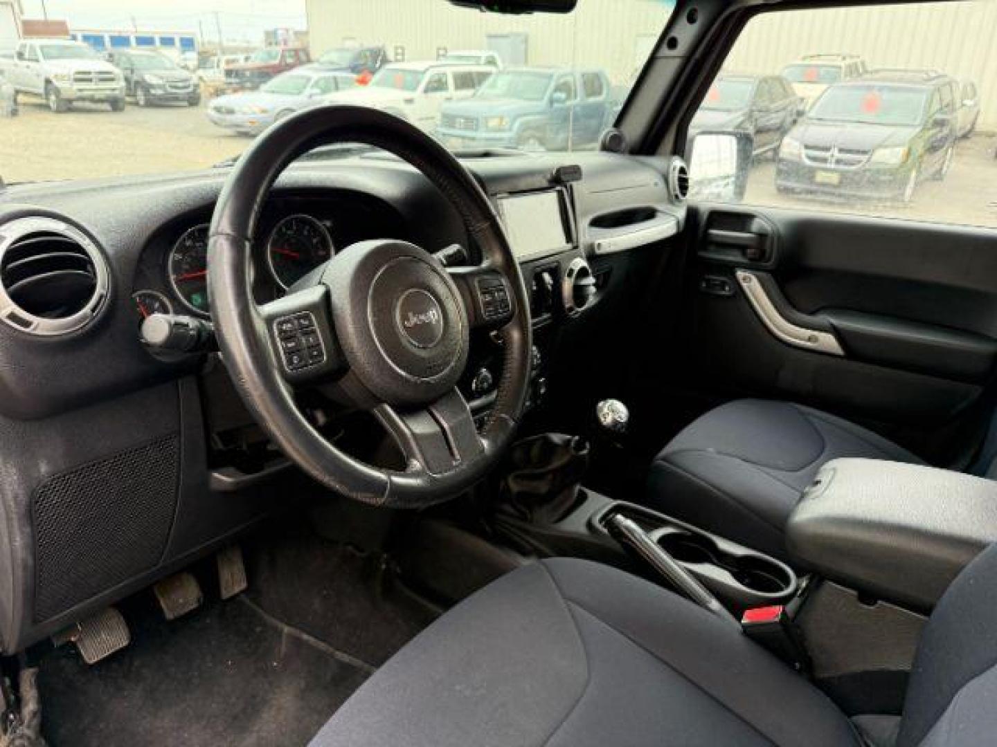 2014 GRAY /CLOTH JEEP WRANGLER UNLIMITED SAHARA (1C4BJWEGXEL) with an V6 engine, MANUAL transmission, located at 1235 N Woodruff Ave., Idaho Falls, 83401, (208) 523-1053, 43.507172, -112.000488 - At Timberline Auto, finding a great deal on your next vehicle is always easy! Our experienced sales staff's goal is to help find you the right vehicle at the right price! Our knowledgeable finance department has options for almost any credit score. We offer extended service contract options to prote - Photo#10