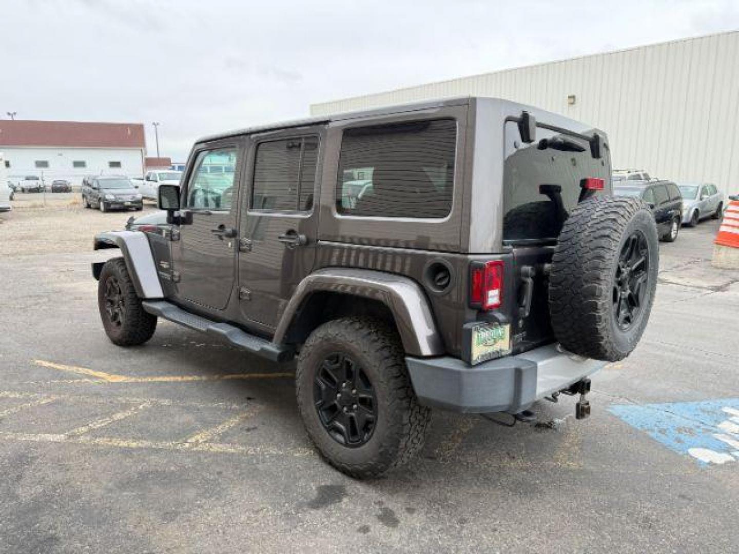 2014 GRAY /CLOTH JEEP WRANGLER UNLIMITED SAHARA (1C4BJWEGXEL) with an V6 engine, MANUAL transmission, located at 1235 N Woodruff Ave., Idaho Falls, 83401, (208) 523-1053, 43.507172, -112.000488 - At Timberline Auto, finding a great deal on your next vehicle is always easy! Our experienced sales staff's goal is to help find you the right vehicle at the right price! Our knowledgeable finance department has options for almost any credit score. We offer extended service contract options to prote - Photo#1