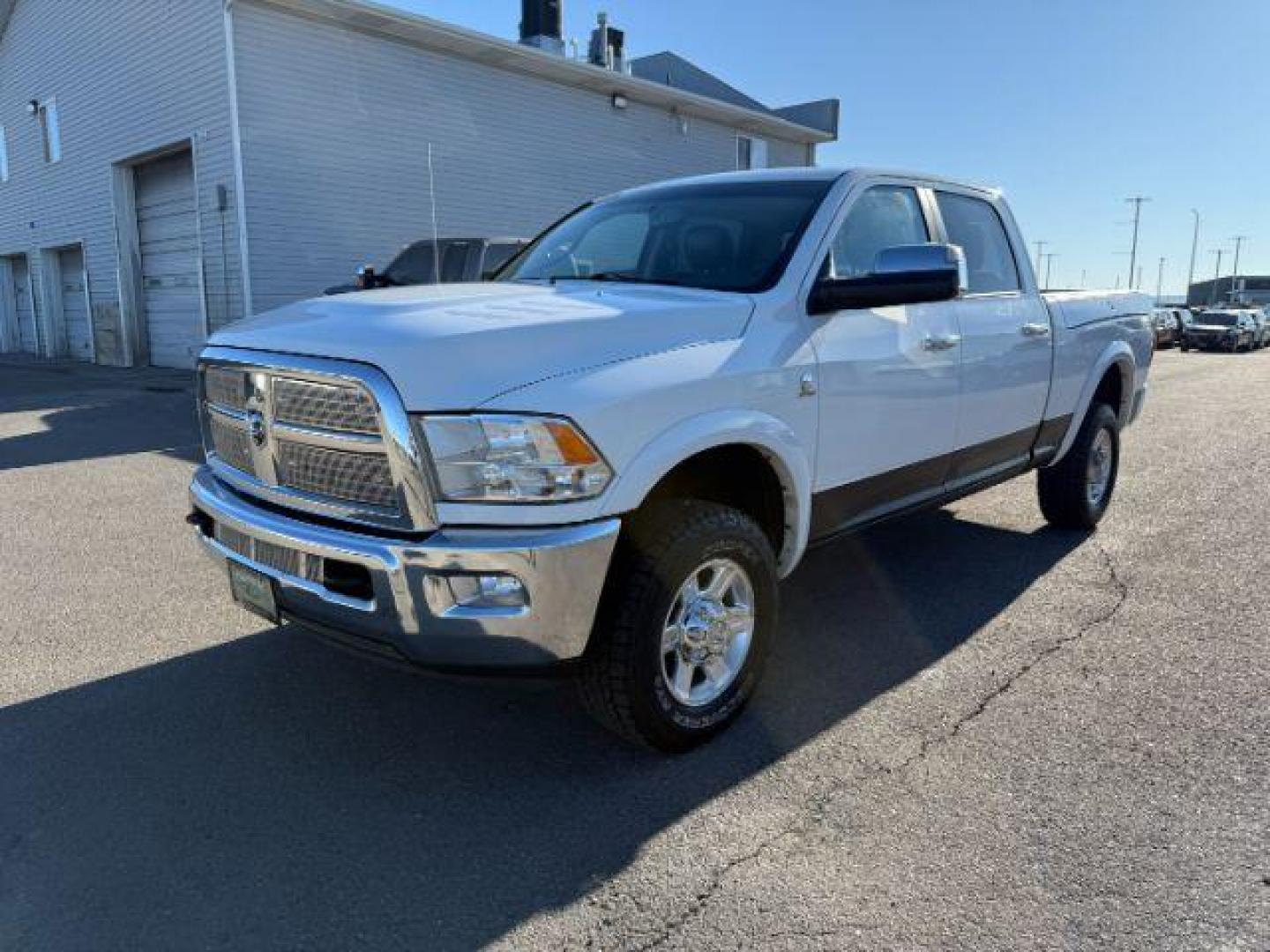 2012 WHITE /LEATHER RAM 2500 LARAMIE LONGHORN (3C6UD5GL6CG) with an 6.7 engine, AUTOMATIC transmission, located at 1235 N Woodruff Ave., Idaho Falls, 83401, (208) 523-1053, 43.507172, -112.000488 - At Timberline Auto, finding a great deal on your next vehicle is always easy! Our experienced sales staff's goal is to help find you the right vehicle at the right price! Our knowledgeable finance department has options for almost any credit score. We offer extended service contract options to prote - Photo#0