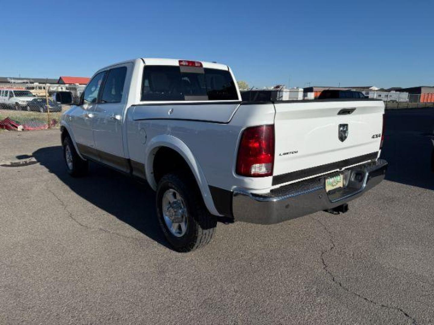 2012 WHITE /LEATHER RAM 2500 LARAMIE LONGHORN (3C6UD5GL6CG) with an 6.7 engine, AUTOMATIC transmission, located at 1235 N Woodruff Ave., Idaho Falls, 83401, (208) 523-1053, 43.507172, -112.000488 - At Timberline Auto, finding a great deal on your next vehicle is always easy! Our experienced sales staff's goal is to help find you the right vehicle at the right price! Our knowledgeable finance department has options for almost any credit score. We offer extended service contract options to prote - Photo#2