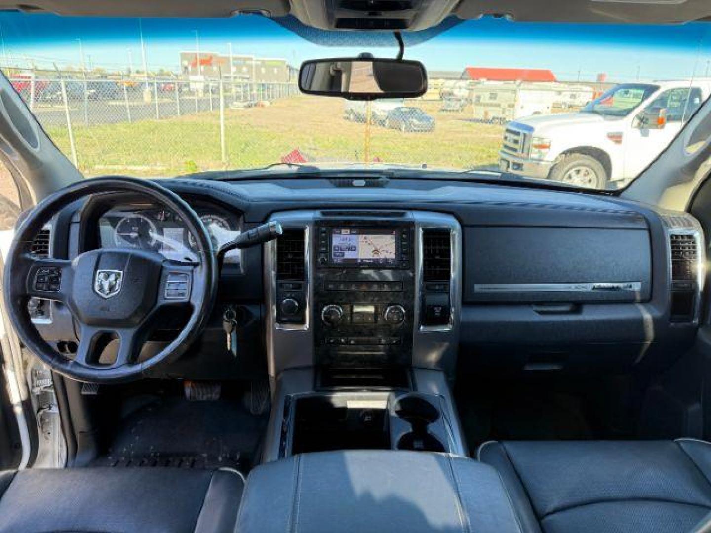 2012 WHITE /LEATHER RAM 2500 LARAMIE LONGHORN (3C6UD5GL6CG) with an 6.7 engine, AUTOMATIC transmission, located at 1235 N Woodruff Ave., Idaho Falls, 83401, (208) 523-1053, 43.507172, -112.000488 - At Timberline Auto, finding a great deal on your next vehicle is always easy! Our experienced sales staff's goal is to help find you the right vehicle at the right price! Our knowledgeable finance department has options for almost any credit score. We offer extended service contract options to prote - Photo#20