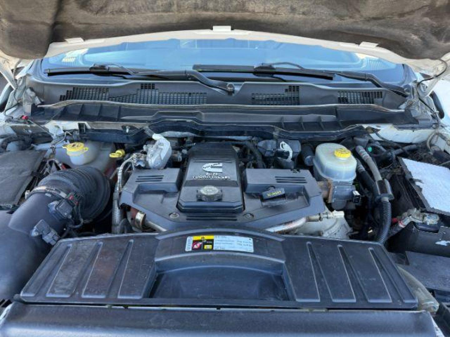 2012 WHITE /LEATHER RAM 2500 LARAMIE LONGHORN (3C6UD5GL6CG) with an 6.7 engine, AUTOMATIC transmission, located at 1235 N Woodruff Ave., Idaho Falls, 83401, (208) 523-1053, 43.507172, -112.000488 - At Timberline Auto, finding a great deal on your next vehicle is always easy! Our experienced sales staff's goal is to help find you the right vehicle at the right price! Our knowledgeable finance department has options for almost any credit score. We offer extended service contract options to prote - Photo#23