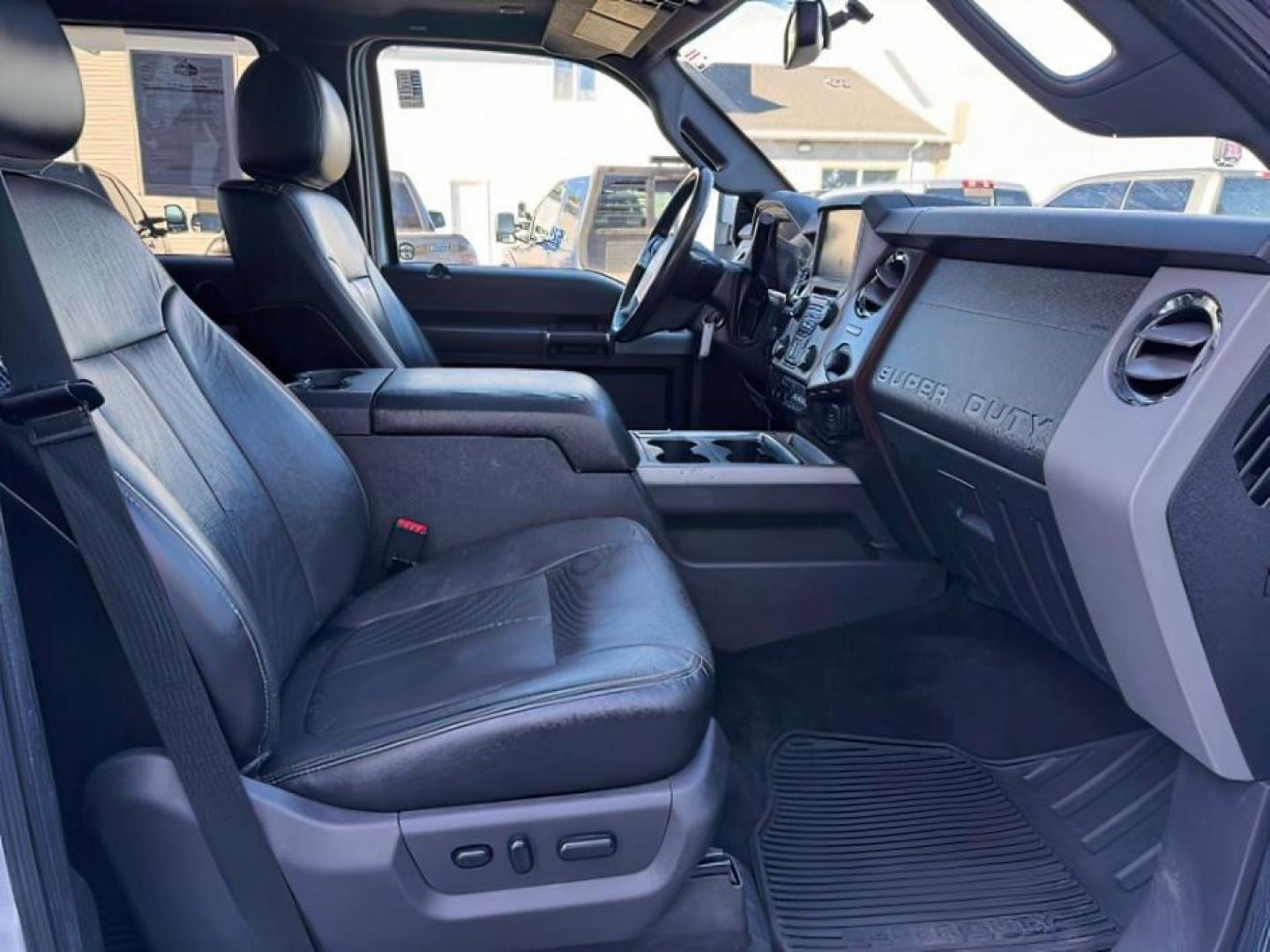 2015 Ingot Silver Metallic /BLACK FORD F350 LARIAT (1FT8W3B65FE) with an 6.2 engine, AUTOMATIC transmission, located at 1235 N Woodruff Ave., Idaho Falls, 83401, (208) 523-1053, 43.507172, -112.000488 - At Timberline Auto, finding a great deal on your next vehicle is always easy! Our experienced sales staff's goal is to help find you the right vehicle at the right price! Our knowledgeable finance department has options for almost any credit score. We offer extended service contract options to prote - Photo#13