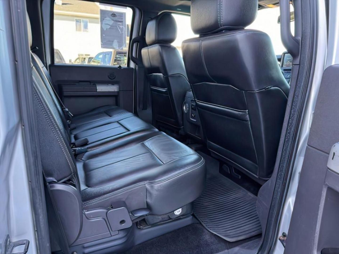 2015 Ingot Silver Metallic /BLACK FORD F350 LARIAT (1FT8W3B65FE) with an 6.2 engine, AUTOMATIC transmission, located at 1235 N Woodruff Ave., Idaho Falls, 83401, (208) 523-1053, 43.507172, -112.000488 - At Timberline Auto, finding a great deal on your next vehicle is always easy! Our experienced sales staff's goal is to help find you the right vehicle at the right price! Our knowledgeable finance department has options for almost any credit score. We offer extended service contract options to prote - Photo#14