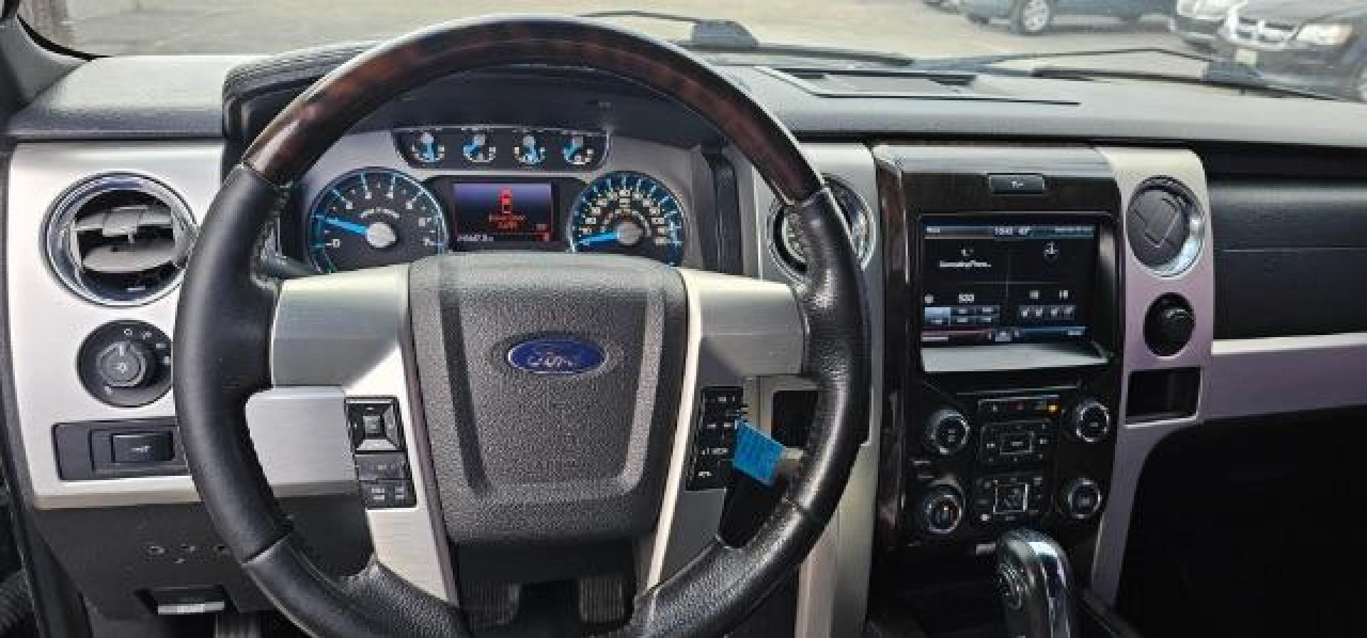 2013 BLACK /BLACK FORD F150 PLATINUM (1FTFW1ET8D1) with an V8 3.5L ECOBOOST engine, AUTOMATIC transmission, located at 1235 N Woodruff Ave., Idaho Falls, 83401, (208) 523-1053, 43.507172, -112.000488 - At Timberline Auto, finding a great deal on your next vehicle is always easy! Our experienced sales staff's goal is to help find you the right vehicle at the right price! Our knowledgeable finance department has options for almost any credit score. We offer extended service contract options to prote - Photo#14