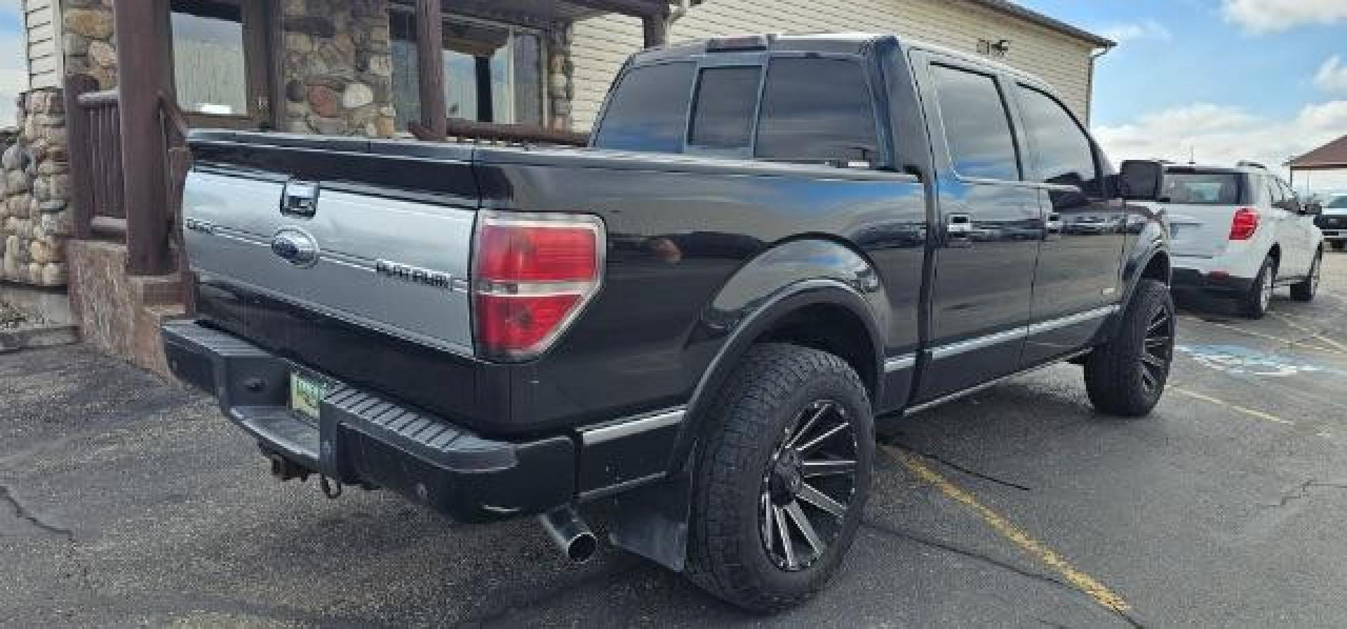 2013 BLACK /BLACK FORD F150 PLATINUM (1FTFW1ET8D1) with an V8 3.5L ECOBOOST engine, AUTOMATIC transmission, located at 1235 N Woodruff Ave., Idaho Falls, 83401, (208) 523-1053, 43.507172, -112.000488 - At Timberline Auto, finding a great deal on your next vehicle is always easy! Our experienced sales staff's goal is to help find you the right vehicle at the right price! Our knowledgeable finance department has options for almost any credit score. We offer extended service contract options to prote - Photo#3