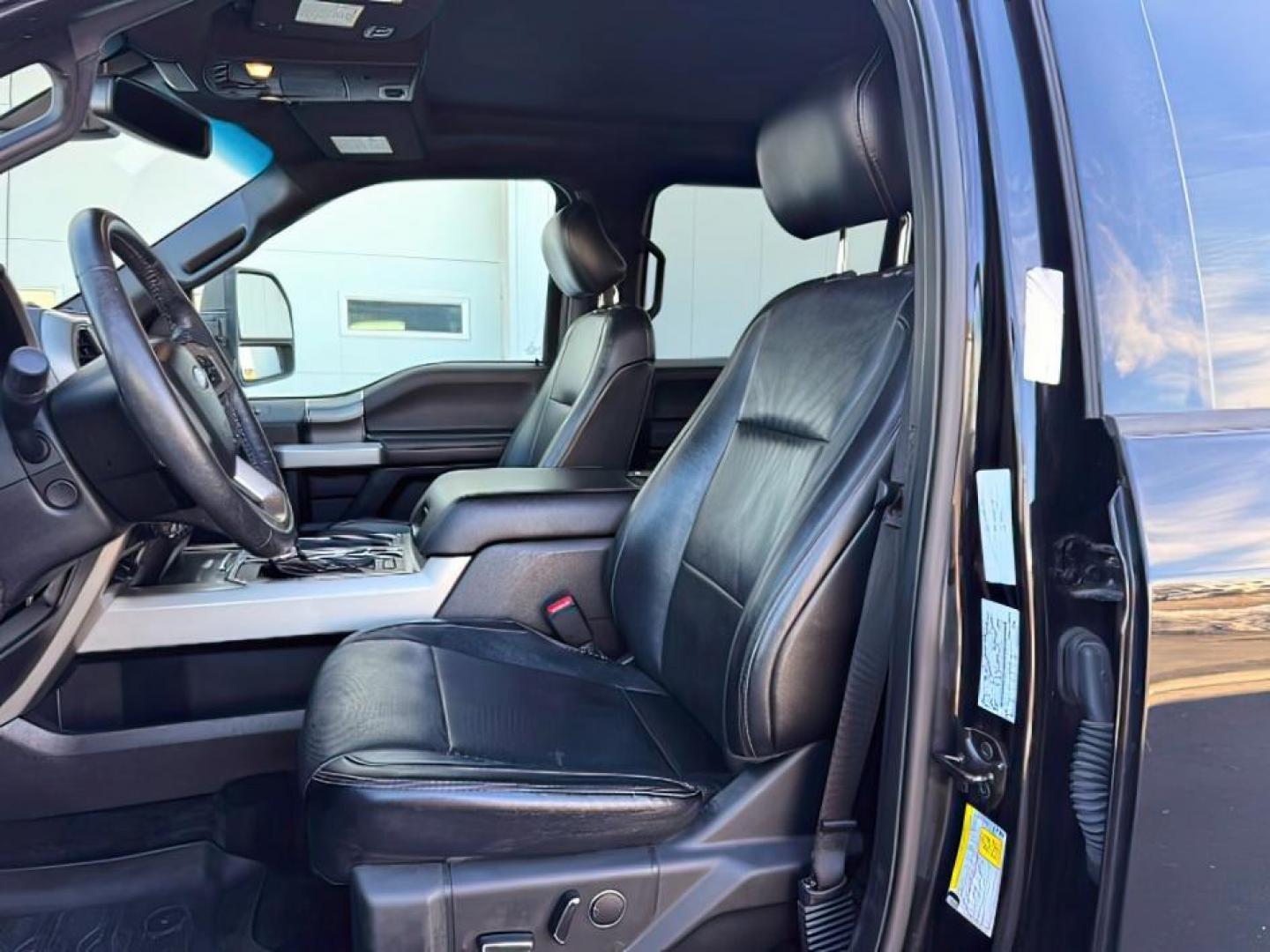 2017 Shadow Black /BLACK FORD F150 LARIAT (1FTEW1EG5HK) with an 5L V-8 DOHC engine, AUTOMATIC transmission, located at 1235 N Woodruff Ave., Idaho Falls, 83401, (208) 523-1053, 43.507172, -112.000488 - At Timberline Auto, finding a great deal on your next vehicle is always easy! Our experienced sales staff's goal is to help find you the right vehicle at the right price! Our knowledgeable finance department has options for almost any credit score. We offer extended service contract options to prote - Photo#8