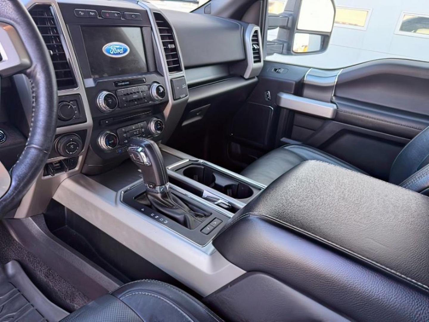 2017 Shadow Black /BLACK FORD F150 LARIAT (1FTEW1EG5HK) with an 5L V-8 DOHC engine, AUTOMATIC transmission, located at 1235 N Woodruff Ave., Idaho Falls, 83401, (208) 523-1053, 43.507172, -112.000488 - At Timberline Auto, finding a great deal on your next vehicle is always easy! Our experienced sales staff's goal is to help find you the right vehicle at the right price! Our knowledgeable finance department has options for almost any credit score. We offer extended service contract options to prote - Photo#10