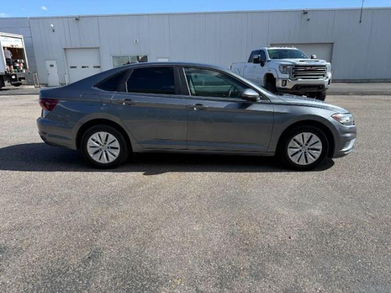 2019 Platinum Gray Metallic /Titan Black Volkswagen Jetta S (3VWN57BU8KM) with an 4 Cyl, 1.4L engine, 6-speed manual transmission, located at 1175 N Woodruff Ave, Idaho Falls, ID, 83401, 43.506901, -111.999657 - <b>Vehicle Details</b><br>Looking for a stylish, dependable compact sedan in Idaho Falls, ID? This pre-owned 2019 Volkswagen Jetta S brings sharp styling, confident Front-Wheel Drive, and a responsive 4-cylinder 1.4L gasoline engine that makes every commute feel smooth and composed. Inside, you'll f- Photo#5