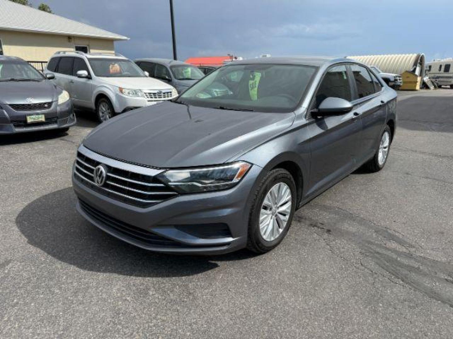 2019 Platinum Gray Metallic /Titan Black Volkswagen Jetta (3VWN57BU8KM) with an 14L I-4 gasoline direct injection engine, Manual transmission, located at 1175 N Woodruff Ave, Idaho Falls, ID, 83401, 43.506901, -111.999657 - At Timberline Auto, finding a great deal on your next vehicle is always easy! Our experienced sales staff's goal is to help find you the right vehicle at the right price! Our knowledgeable finance department has options for almost any credit score. We offer extended service contract options to prote - Photo#0