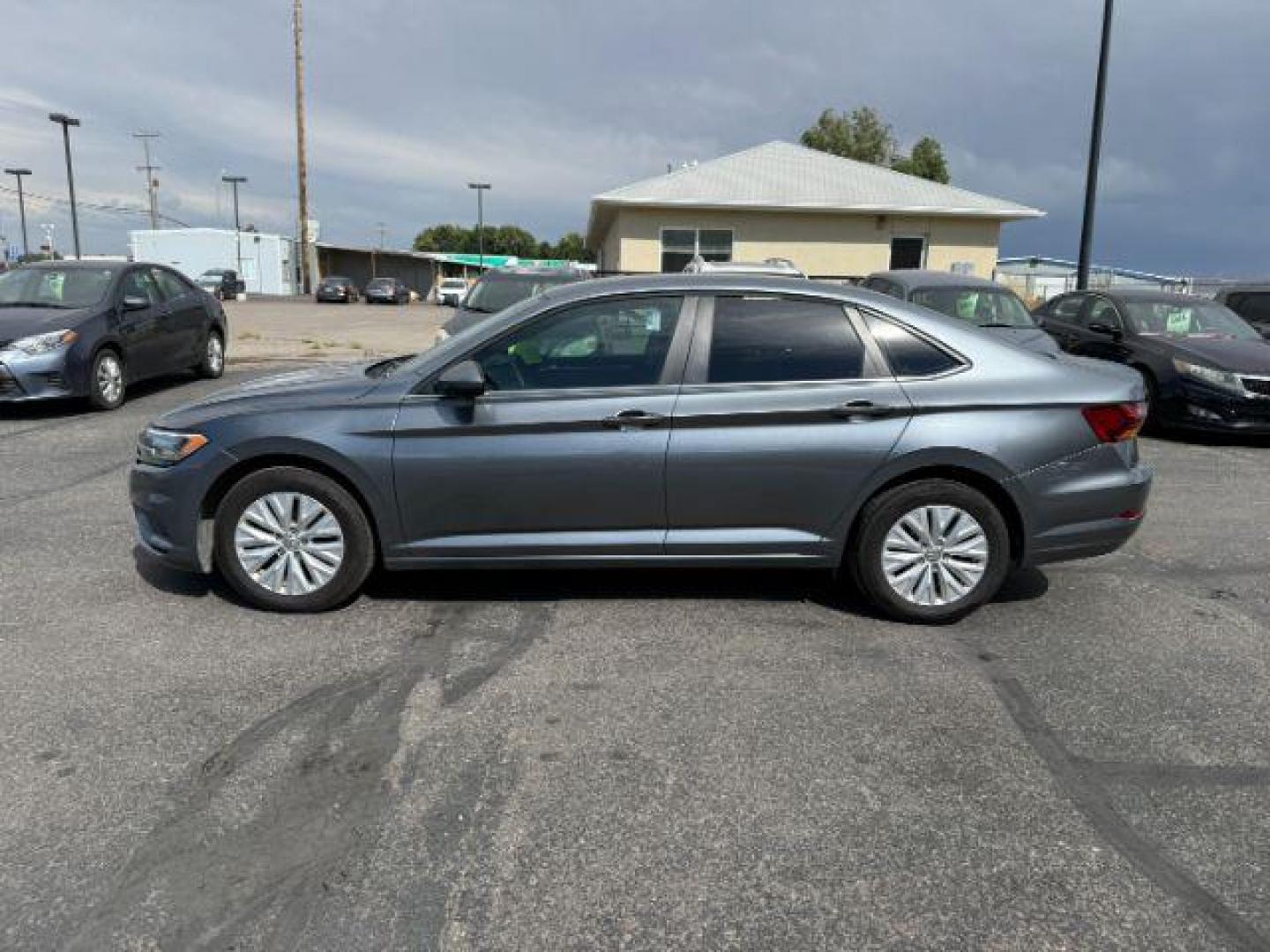 2019 Platinum Gray Metallic /Titan Black Volkswagen Jetta (3VWN57BU8KM) with an 14L I-4 gasoline direct injection engine, Manual transmission, located at 1175 N Woodruff Ave, Idaho Falls, ID, 83401, 43.506901, -111.999657 - At Timberline Auto, finding a great deal on your next vehicle is always easy! Our experienced sales staff's goal is to help find you the right vehicle at the right price! Our knowledgeable finance department has options for almost any credit score. We offer extended service contract options to prote - Photo#1
