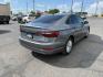 2019 Platinum Gray Metallic /Titan Black Volkswagen Jetta (3VWN57BU8KM) with an 14L I-4 gasoline direct injection engine, Manual transmission, located at 1175 N Woodruff Ave, Idaho Falls, ID, 83401, 43.506901, -111.999657 - At Timberline Auto, finding a great deal on your next vehicle is always easy! Our experienced sales staff's goal is to help find you the right vehicle at the right price! Our knowledgeable finance department has options for almost any credit score. We offer extended service contract options to prote - Photo#4