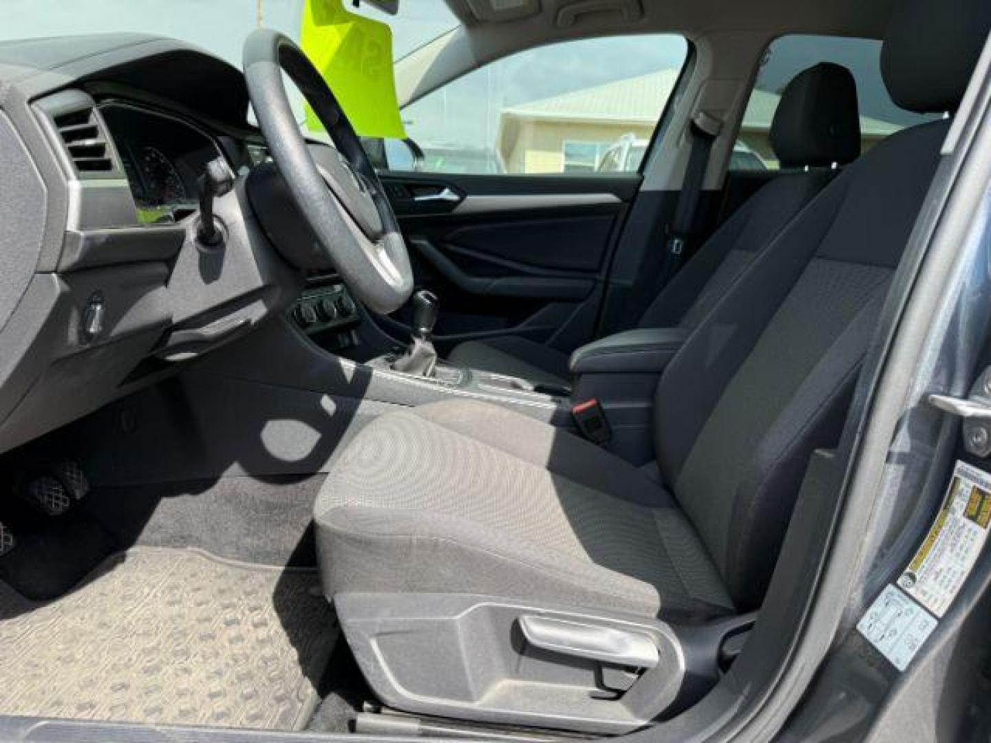 2019 Platinum Gray Metallic /Titan Black Volkswagen Jetta (3VWN57BU8KM) with an 14L I-4 gasoline direct injection engine, Manual transmission, located at 1175 N Woodruff Ave, Idaho Falls, ID, 83401, 43.506901, -111.999657 - At Timberline Auto, finding a great deal on your next vehicle is always easy! Our experienced sales staff's goal is to help find you the right vehicle at the right price! Our knowledgeable finance department has options for almost any credit score. We offer extended service contract options to prote - Photo#10
