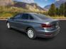 2019 Platinum Gray Metallic /Titan Black Volkswagen Jetta (3VWN57BU8KM) with an 14L I-4 gasoline direct injection engine, Manual transmission, located at 1175 N Woodruff Ave, Idaho Falls, ID, 83401, 43.506901, -111.999657 - At Timberline Auto, finding a great deal on your next vehicle is always easy! Our experienced sales staff's goal is to help find you the right vehicle at the right price! Our knowledgeable finance department has options for almost any credit score. We offer extended service contract options to prote - Photo#2