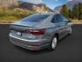 2019 Platinum Gray Metallic /Titan Black Volkswagen Jetta (3VWN57BU8KM) with an 14L I-4 gasoline direct injection engine, Manual transmission, located at 1175 N Woodruff Ave, Idaho Falls, ID, 83401, 43.506901, -111.999657 - At Timberline Auto, finding a great deal on your next vehicle is always easy! Our experienced sales staff's goal is to help find you the right vehicle at the right price! Our knowledgeable finance department has options for almost any credit score. We offer extended service contract options to prote - Photo#4