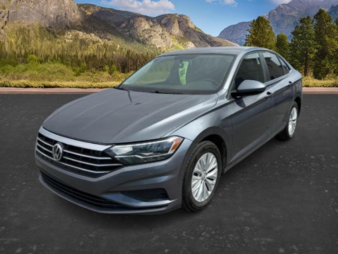 2019 Platinum Gray Metallic /Titan Black Volkswagen Jetta (3VWN57BU8KM) with an 14L I-4 gasoline direct injection engine, located at 1175 N Woodruff Ave, Idaho Falls, ID, 83401, 43.506901, -111.999657 - At Timberline Auto, finding a great deal on your next vehicle is always easy! Our experienced sales staff's goal is to help find you the right vehicle at the right price! Our knowledgeable finance department has options for almost any credit score. We offer extended service contract options to prote - Photo#0