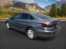 2019 Platinum Gray Metallic /Titan Black Volkswagen Jetta (3VWN57BU8KM) with an 14L I-4 gasoline direct injection engine, located at 1175 N Woodruff Ave, Idaho Falls, ID, 83401, 43.506901, -111.999657 - At Timberline Auto, finding a great deal on your next vehicle is always easy! Our experienced sales staff's goal is to help find you the right vehicle at the right price! Our knowledgeable finance department has options for almost any credit score. We offer extended service contract options to prote - Photo#2