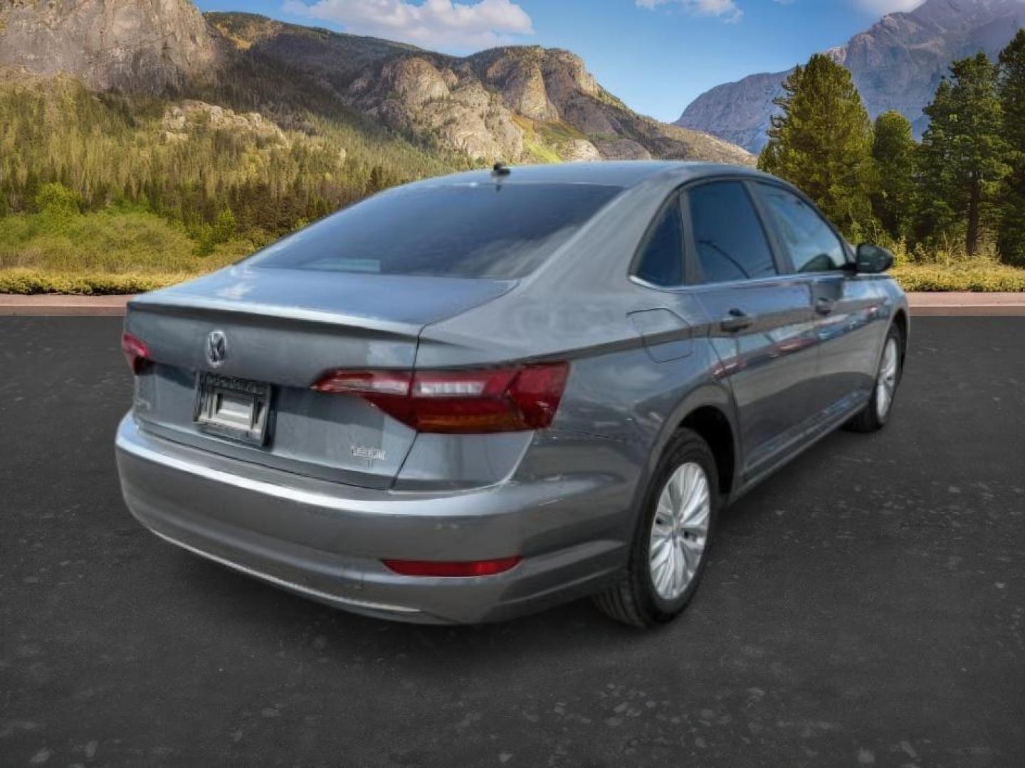 2019 Platinum Gray Metallic /Titan Black Volkswagen Jetta (3VWN57BU8KM) with an 14L I-4 gasoline direct injection engine, located at 1175 N Woodruff Ave, Idaho Falls, ID, 83401, 43.506901, -111.999657 - At Timberline Auto, finding a great deal on your next vehicle is always easy! Our experienced sales staff's goal is to help find you the right vehicle at the right price! Our knowledgeable finance department has options for almost any credit score. We offer extended service contract options to prote - Photo#4