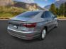 2019 Platinum Gray Metallic /Titan Black Volkswagen Jetta (3VWN57BU8KM) with an 14L I-4 gasoline direct injection engine, located at 1175 N Woodruff Ave, Idaho Falls, ID, 83401, 43.506901, -111.999657 - At Timberline Auto, finding a great deal on your next vehicle is always easy! Our experienced sales staff's goal is to help find you the right vehicle at the right price! Our knowledgeable finance department has options for almost any credit score. We offer extended service contract options to prote - Photo#4