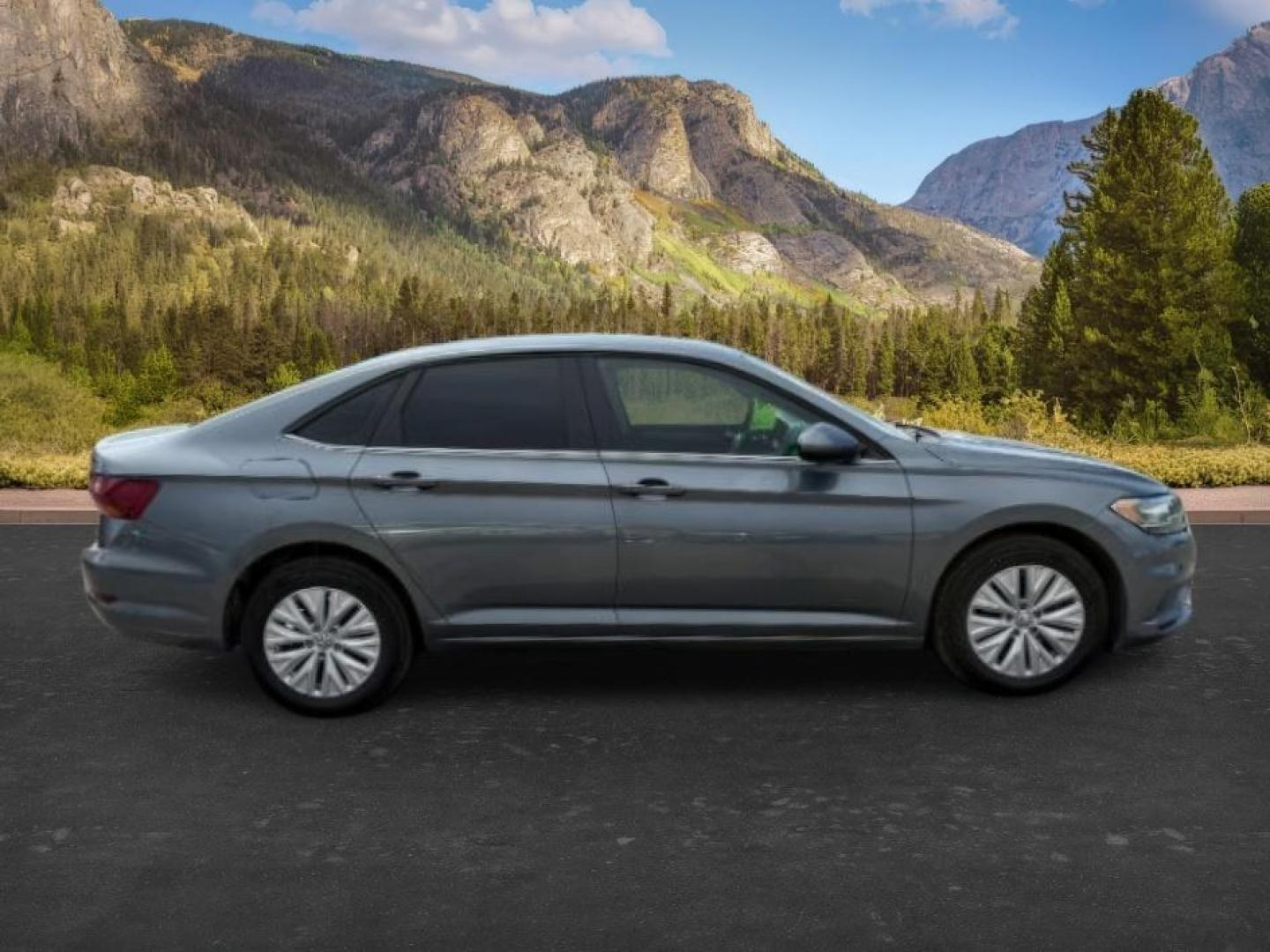2019 Platinum Gray Metallic /Titan Black Volkswagen Jetta (3VWN57BU8KM) with an 14L I-4 gasoline direct injection engine, located at 1175 N Woodruff Ave, Idaho Falls, ID, 83401, 43.506901, -111.999657 - At Timberline Auto, finding a great deal on your next vehicle is always easy! Our experienced sales staff's goal is to help find you the right vehicle at the right price! Our knowledgeable finance department has options for almost any credit score. We offer extended service contract options to prote - Photo#5