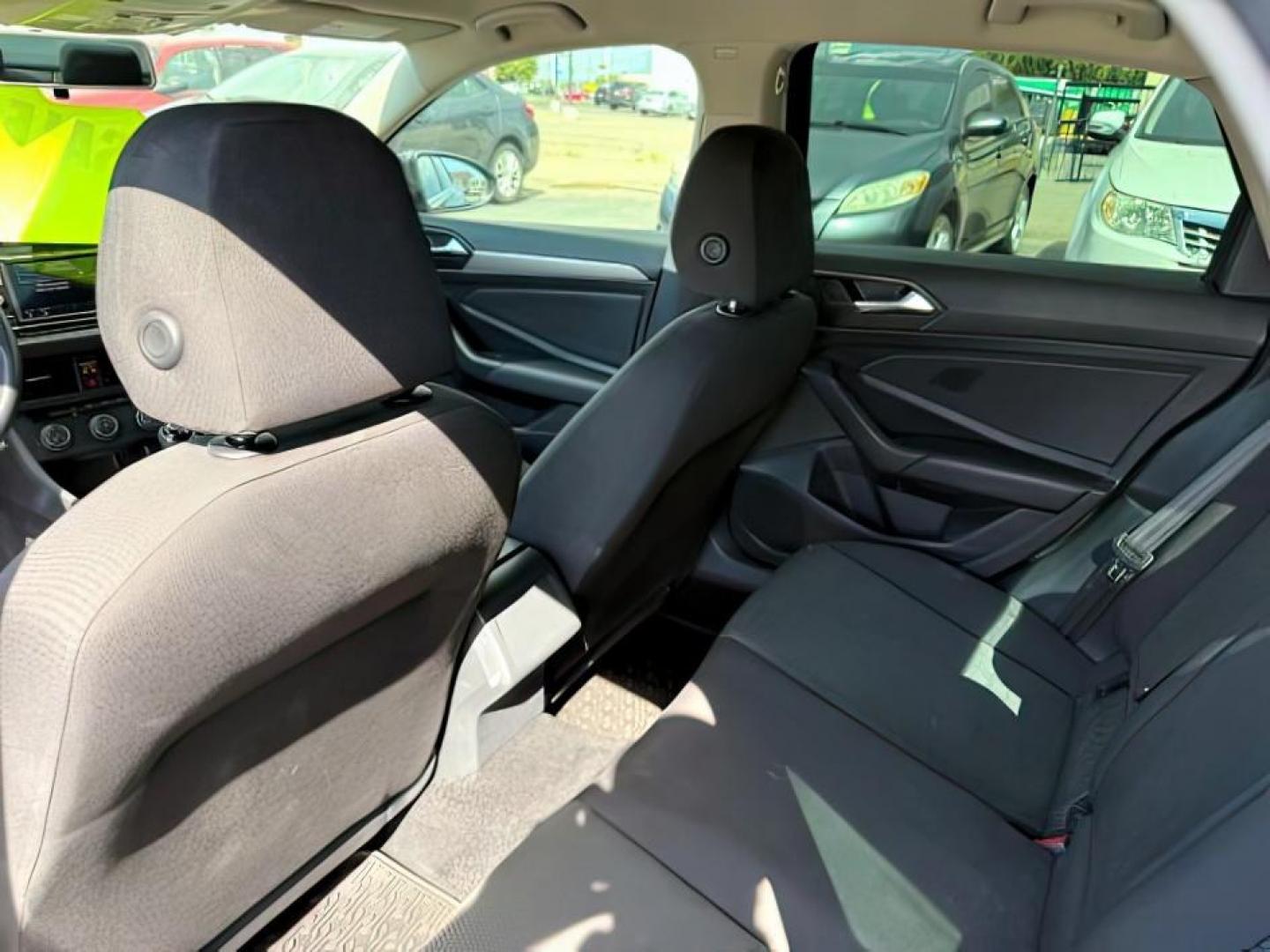 2019 Platinum Gray Metallic /Titan Black Volkswagen Jetta (3VWN57BU8KM) with an 14L I-4 gasoline direct injection engine, located at 1175 N Woodruff Ave, Idaho Falls, ID, 83401, 43.506901, -111.999657 - At Timberline Auto, finding a great deal on your next vehicle is always easy! Our experienced sales staff's goal is to help find you the right vehicle at the right price! Our knowledgeable finance department has options for almost any credit score. We offer extended service contract options to prote - Photo#18