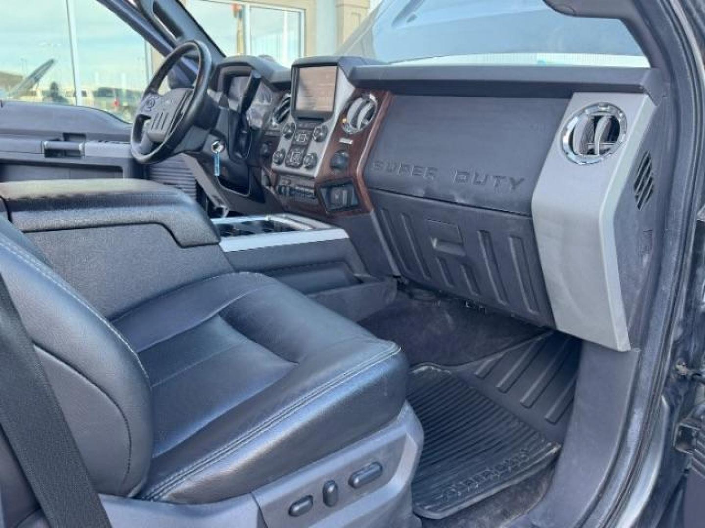 2016 GRAY /Black FORD F350 LARIAT (1FT8W3B62GE) with an 6.2 engine, AUTOMATIC transmission, located at 1235 N Woodruff Ave., Idaho Falls, 83401, (208) 523-1053, 43.507172, -112.000488 - At Timberline Auto, finding a great deal on your next vehicle is always easy! Our experienced sales staff's goal is to help find you the right vehicle at the right price! Our knowledgeable finance department has options for almost any credit score. We offer extended service contract options to prote - Photo#18
