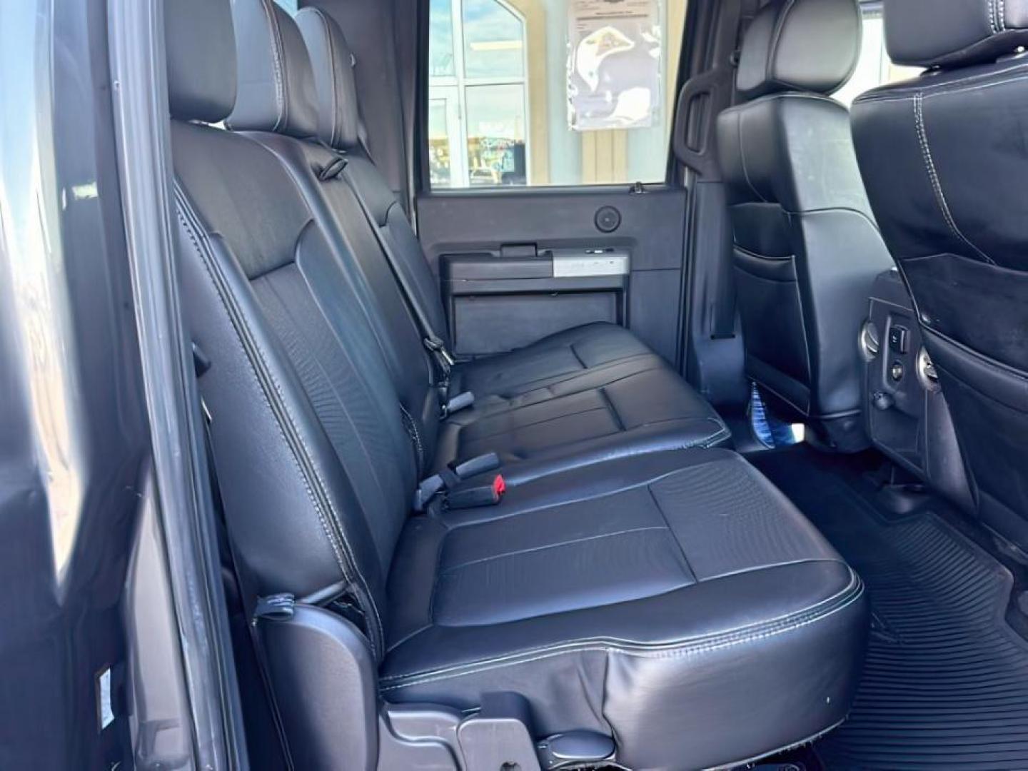 2016 GRAY /Black FORD F350 LARIAT (1FT8W3B62GE) with an 6.2 engine, AUTOMATIC transmission, located at 1235 N Woodruff Ave., Idaho Falls, 83401, (208) 523-1053, 43.507172, -112.000488 - At Timberline Auto, finding a great deal on your next vehicle is always easy! Our experienced sales staff's goal is to help find you the right vehicle at the right price! Our knowledgeable finance department has options for almost any credit score. We offer extended service contract options to prote - Photo#21