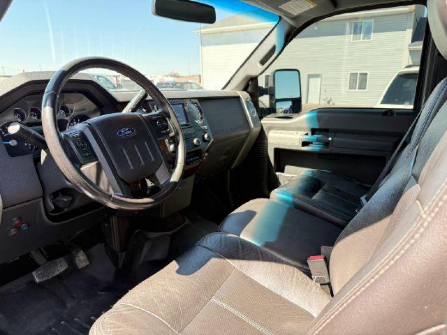 2012 Sterling Gray /Black FORD F350 LARIAT (1FT8X3BT8CE) with an Powerstroke 6.7L V-8 diesel direct injection engine, AUTOMATIC transmission, located at 1235 N Woodruff Ave., Idaho Falls, 83401, (208) 523-1053, 43.507172, -112.000488 - At Timberline Auto, finding a great deal on your next vehicle is always easy! Our experienced sales staff's goal is to help find you the right vehicle at the right price! Our knowledgeable finance department has options for almost any credit score. We offer extended service contract options to prote - Photo#10