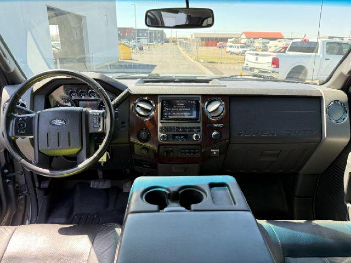 2012 Sterling Gray /Black FORD F350 LARIAT (1FT8X3BT8CE) with an Powerstroke 6.7L V-8 diesel direct injection engine, AUTOMATIC transmission, located at 1235 N Woodruff Ave., Idaho Falls, 83401, (208) 523-1053, 43.507172, -112.000488 - At Timberline Auto, finding a great deal on your next vehicle is always easy! Our experienced sales staff's goal is to help find you the right vehicle at the right price! Our knowledgeable finance department has options for almost any credit score. We offer extended service contract options to prote - Photo#17