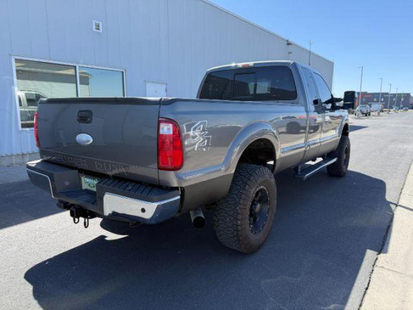 2012 Sterling Gray /Black FORD F350 LARIAT (1FT8X3BT8CE) with an Powerstroke 6.7L V-8 diesel direct injection engine, AUTOMATIC transmission, located at 1235 N Woodruff Ave., Idaho Falls, 83401, (208) 523-1053, 43.507172, -112.000488 - At Timberline Auto, finding a great deal on your next vehicle is always easy! Our experienced sales staff's goal is to help find you the right vehicle at the right price! Our knowledgeable finance department has options for almost any credit score. We offer extended service contract options to prote - Photo#4
