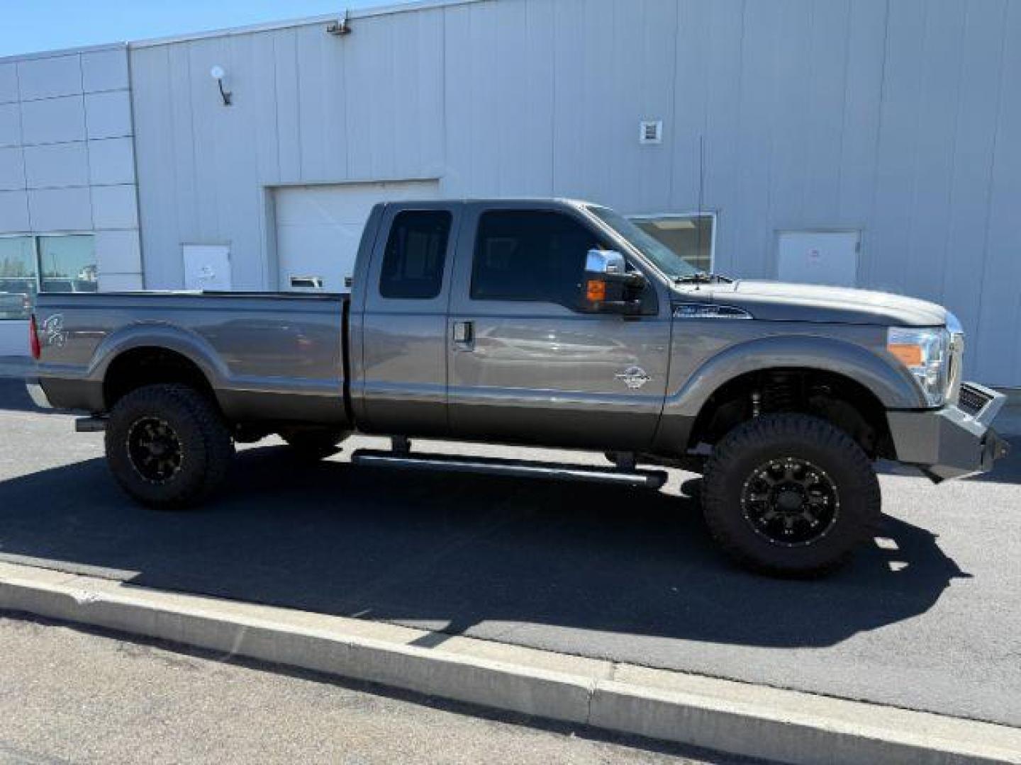 2012 Sterling Gray /Black FORD F350 LARIAT (1FT8X3BT8CE) with an Powerstroke 6.7L V-8 diesel direct injection engine, AUTOMATIC transmission, located at 1235 N Woodruff Ave., Idaho Falls, 83401, (208) 523-1053, 43.507172, -112.000488 - At Timberline Auto, finding a great deal on your next vehicle is always easy! Our experienced sales staff's goal is to help find you the right vehicle at the right price! Our knowledgeable finance department has options for almost any credit score. We offer extended service contract options to prote - Photo#5