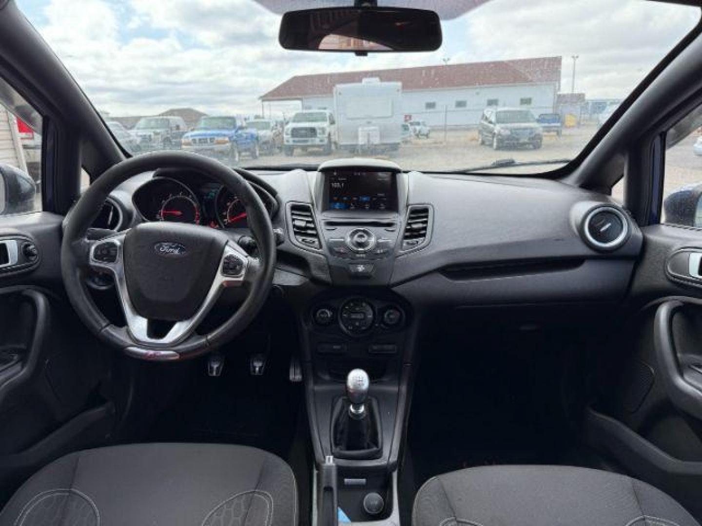 2016 Kona Blue Metallic /Charcoal Black FORD FIESTA ST (3FADP4GXXGM) with an EcoBoost 1.6L I-4 gasoline direct injection engine, MANUAL transmission, located at 1235 N Woodruff Ave., Idaho Falls, 83401, (208) 523-1053, 43.507172, -112.000488 - At Timberline Auto, finding a great deal on your next vehicle is always easy! Our experienced sales staff's goal is to help find you the right vehicle at the right price! Our knowledgeable finance department has options for almost any credit score. We offer extended service contract options to prote - Photo#13