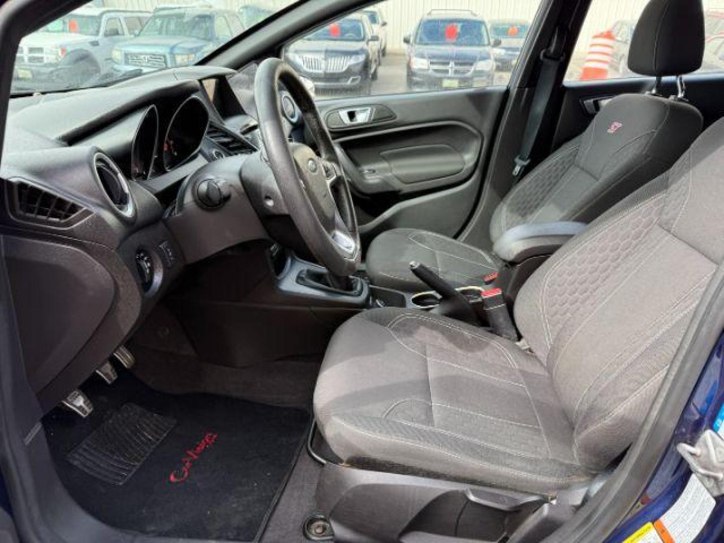 2016 Kona Blue Metallic /Charcoal Black FORD FIESTA ST (3FADP4GXXGM) with an EcoBoost 1.6L I-4 gasoline direct injection engine, MANUAL transmission, located at 1235 N Woodruff Ave., Idaho Falls, 83401, (208) 523-1053, 43.507172, -112.000488 - At Timberline Auto, finding a great deal on your next vehicle is always easy! Our experienced sales staff's goal is to help find you the right vehicle at the right price! Our knowledgeable finance department has options for almost any credit score. We offer extended service contract options to prote - Photo#7