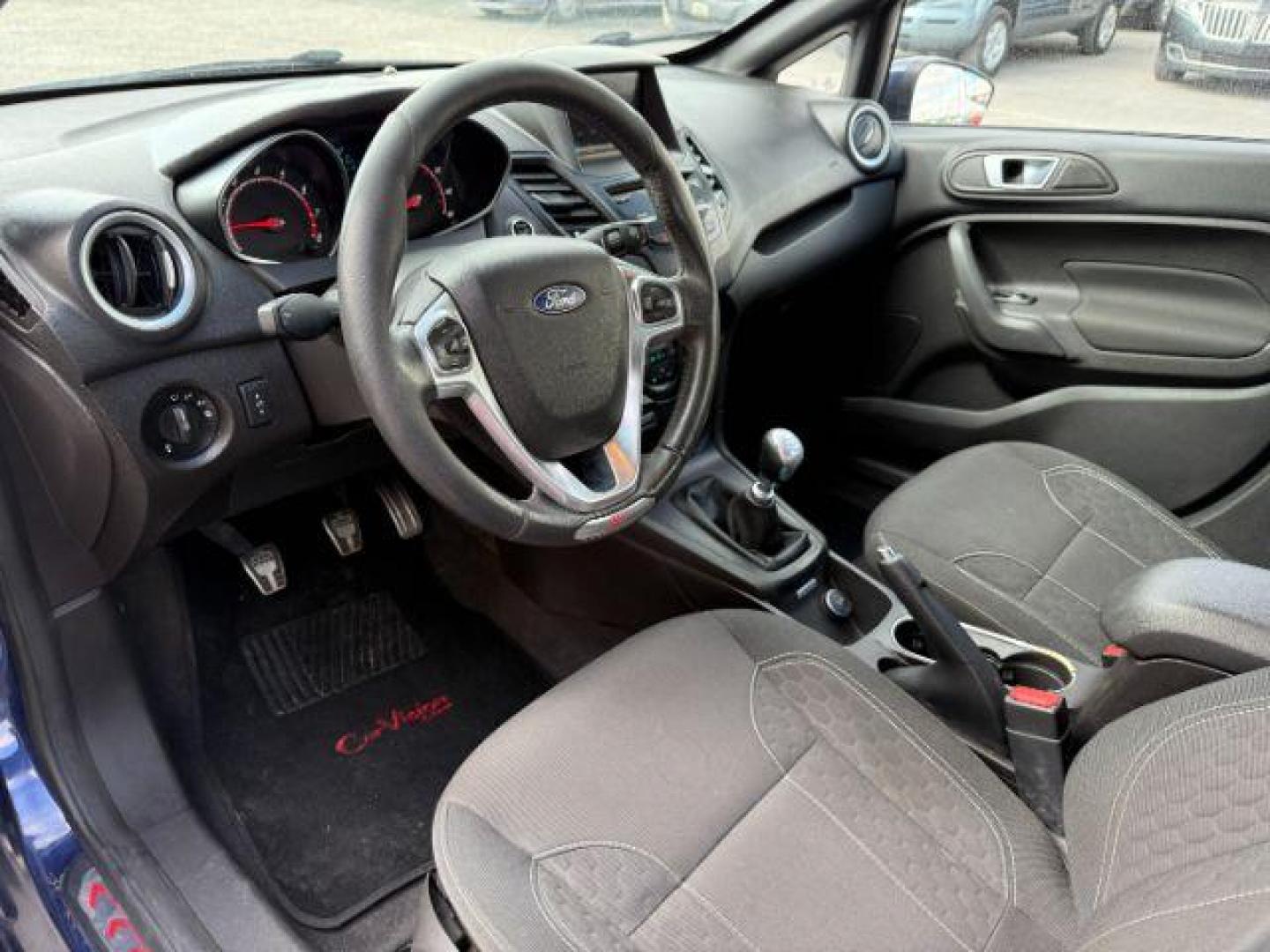 2016 Kona Blue Metallic /Charcoal Black FORD FIESTA ST (3FADP4GXXGM) with an EcoBoost 1.6L I-4 gasoline direct injection engine, MANUAL transmission, located at 1235 N Woodruff Ave., Idaho Falls, 83401, (208) 523-1053, 43.507172, -112.000488 - At Timberline Auto, finding a great deal on your next vehicle is always easy! Our experienced sales staff's goal is to help find you the right vehicle at the right price! Our knowledgeable finance department has options for almost any credit score. We offer extended service contract options to prote - Photo#8