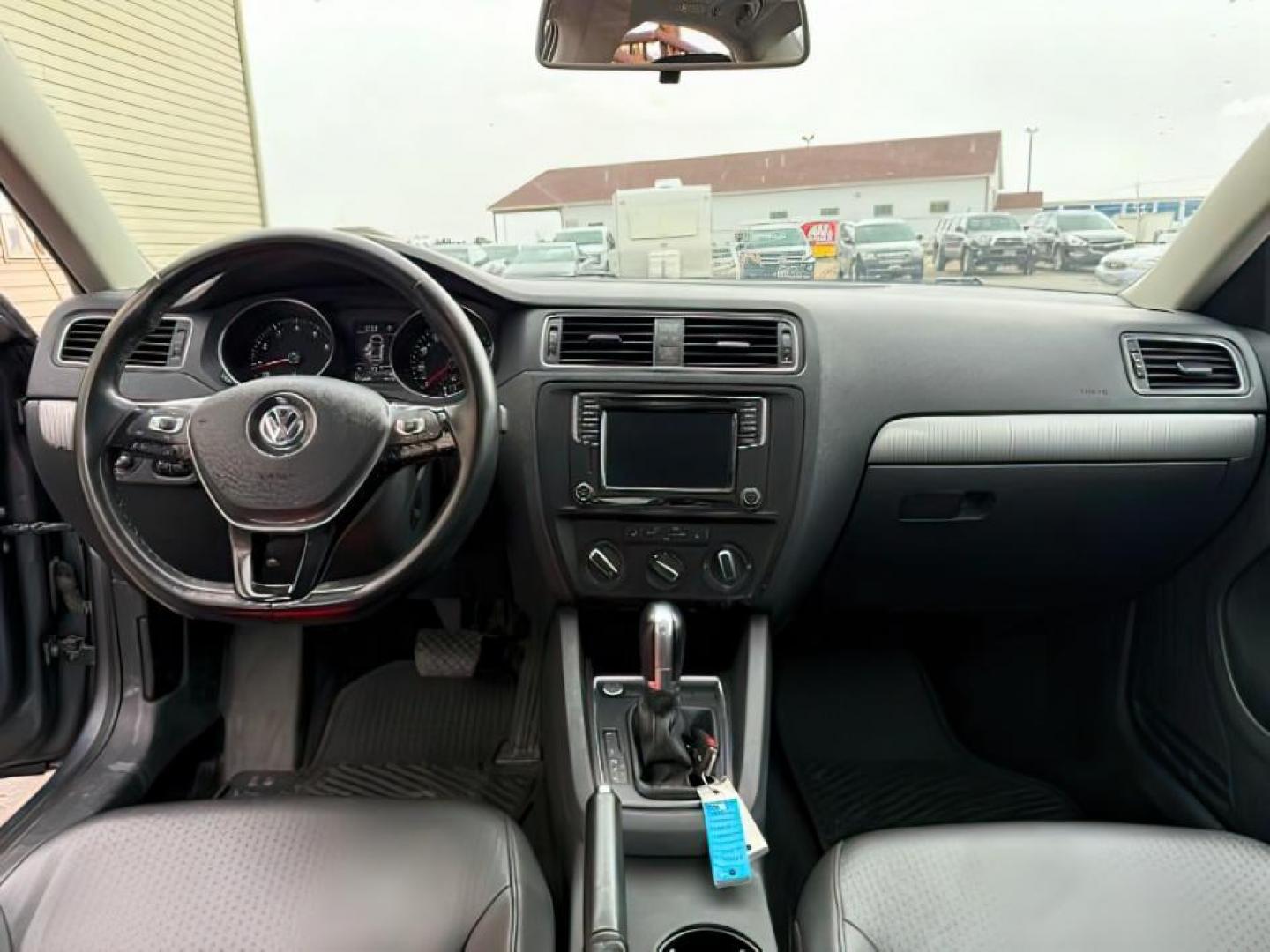 2017 GRAY /LEATHER Volkswagen JETTA (3VWDB7AJ4HM) with an 4CYL engine, Automatic transmission, located at 1175 N Woodruff Ave, Idaho Falls, ID, 83401, 43.506901, -111.999657 - At Timberline Auto, finding a great deal on your next vehicle is always easy! Our experienced sales staff's goal is to help find you the right vehicle at the right price! Our knowledgeable finance department has options for almost any credit score. We offer extended service contract options to prote - Photo#15